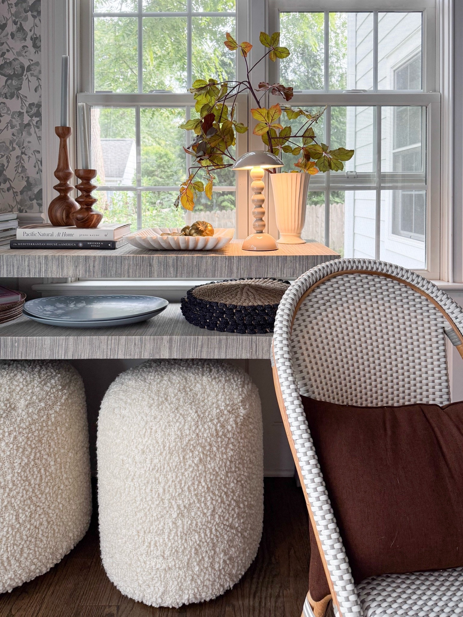 This little corner feels so ready for fall. I love the mix of warm branches, sculptural lighting, wood candlesticks, woven textures, and cozy boucle stools for a space that feels layered and collected without being overdone.

fall home decor, fall decorating ideas, seasonal branches, boucle stools, woven chair, console table styling, wood candlesticks, neutral fall decor, cozy home accents, layered interiors, modern coastal home, girlonthehudson

#LTKHome #LTKSeasonal #LTKdayinmylife