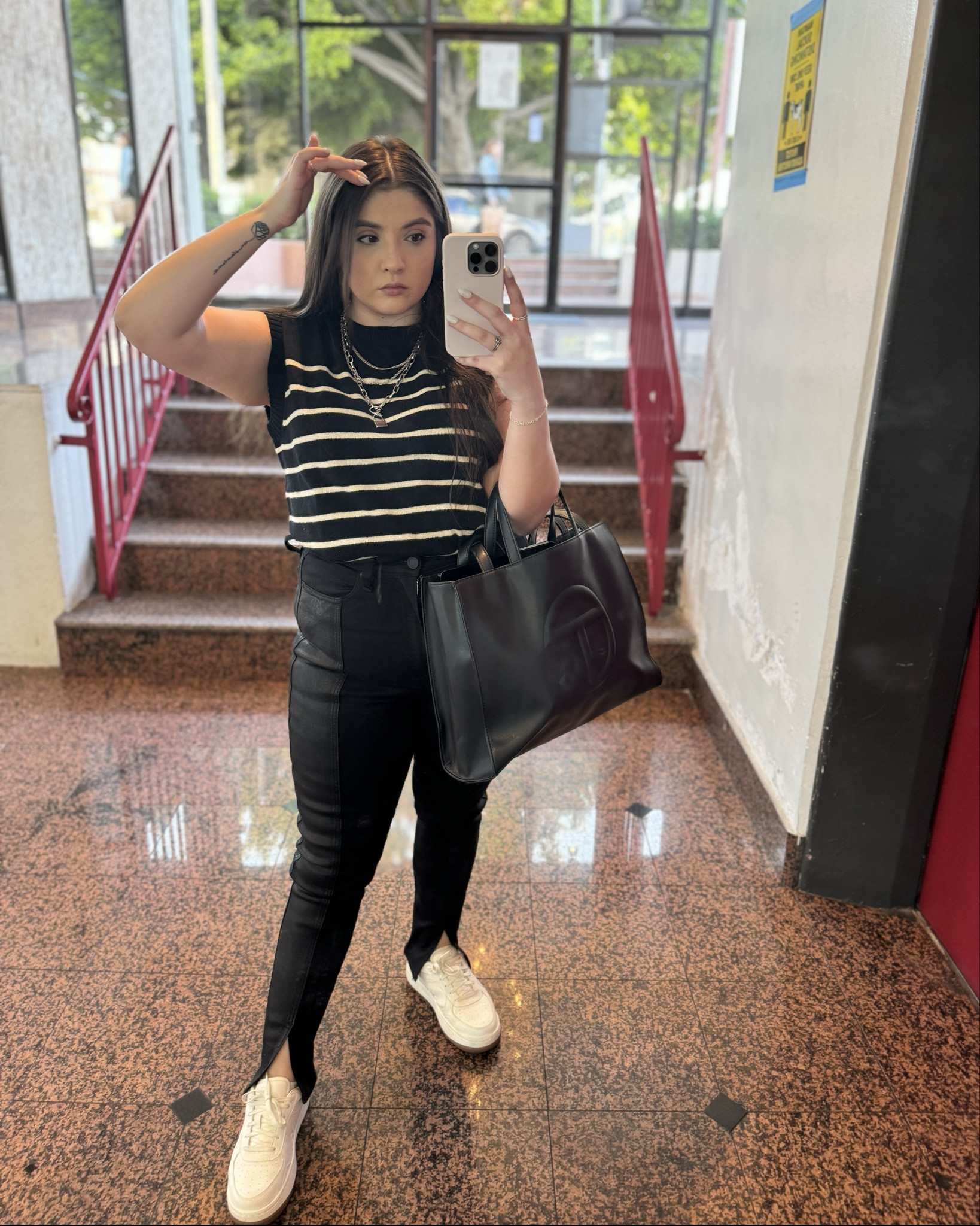 If I walk out of my apartment and think to myself “this is FASHION”, then I know I’m feeling myself. 💅🏼🤪

Felt like being a little extra at work today and tried out my new Revolve Hudson Jeans Centerfold High Rise Split black coated pants. I don’t usually stray from traditional cuts, but I have a feeling these will become a work staple (especially with some heels). 👩🏻‍💻

Wearing Revolve, Alo Yoga sneakers, Telfar shopper, and Amazon top. 💫

#LTKpetite

#LTKmidsize #LTKworkwear #LTKstyletip