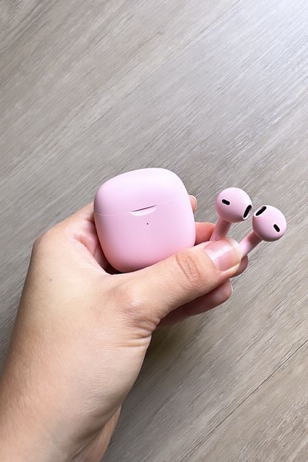 Pink wireless/bluetooth headphones. Reminds me of the AirPods - but these are under $20 and come in a variety of colors 

#LTKSaleAlert #LTKFindsUnder50 #LTKTravel