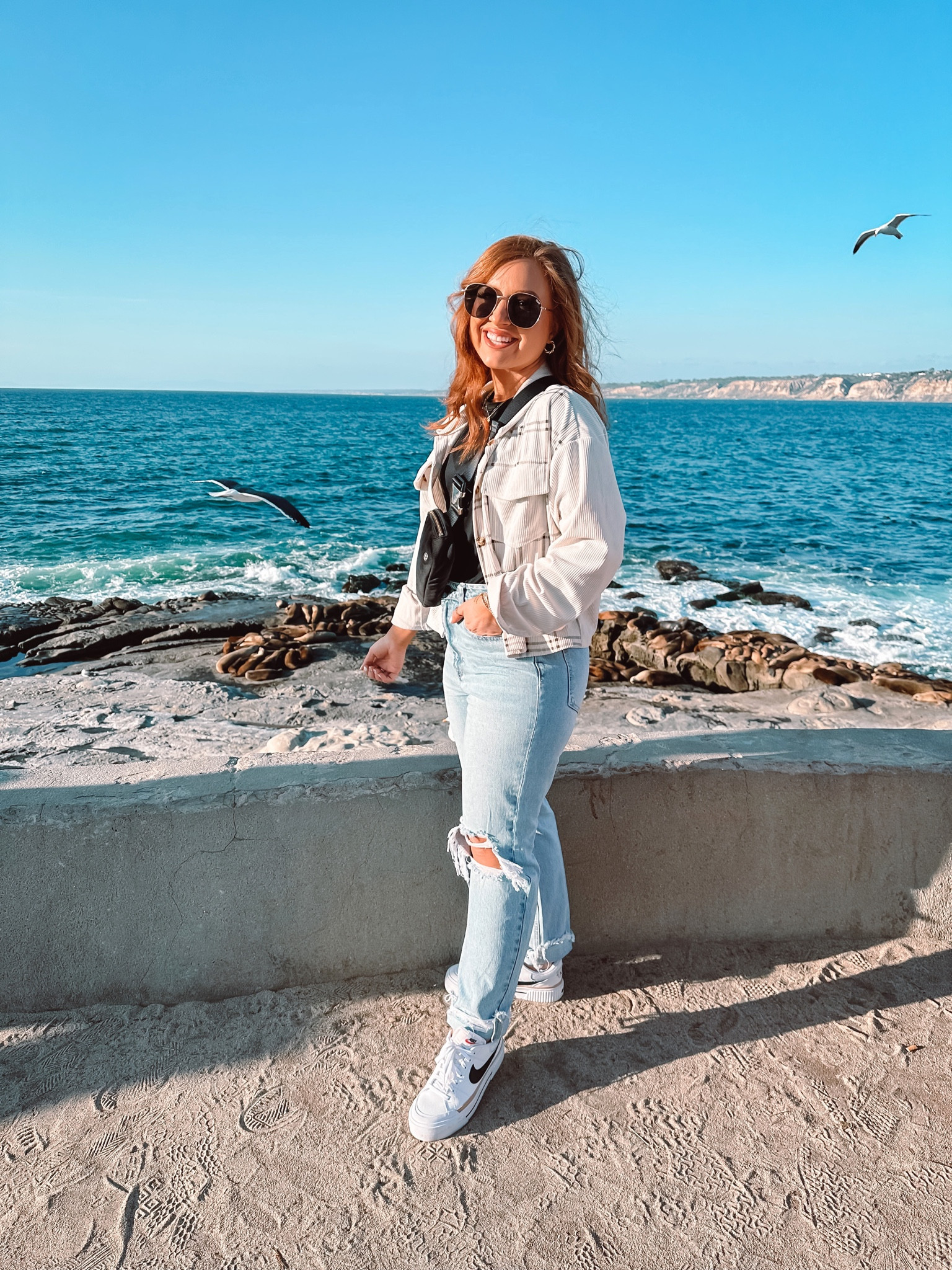 Outfit day one in San Diego! 

Small cropped Shacket 
Medium black T-shirt bodysuit 
Size 9 jeans (fit like a 5) 

#LTKFind #LTKtravel #LTKunder50