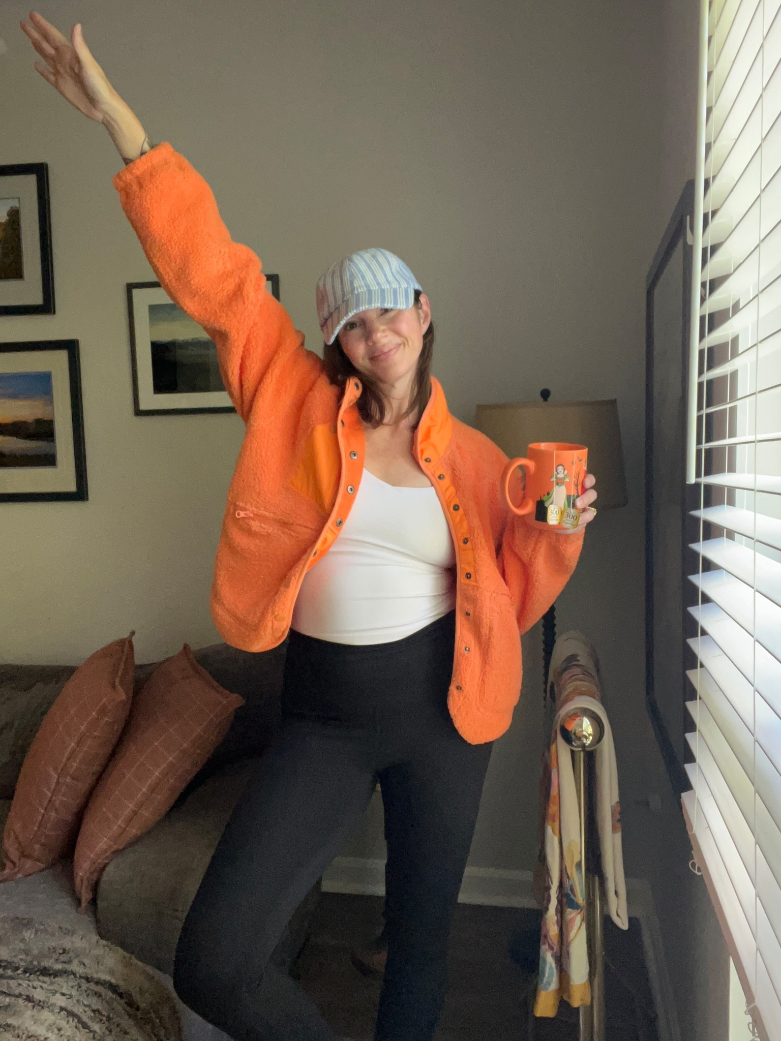 Amazon snap front fleece jacket and Walmart blue striped baseball hat 