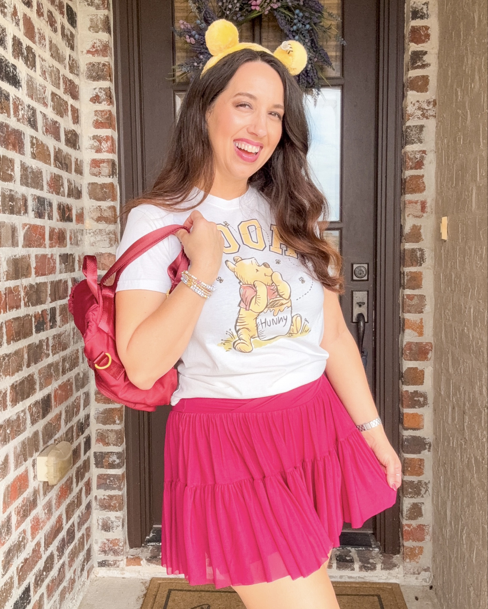 Starting my Monday with a little Winnie the Pooh energy 🧸🍯✨

Outfit details 👇
• Top: @Target 
• Skirt: @blogilates 
• Backpack: Box lunch 
• Ears: Disney store 

#LTKTravel #LTKgrwm #LTKActive