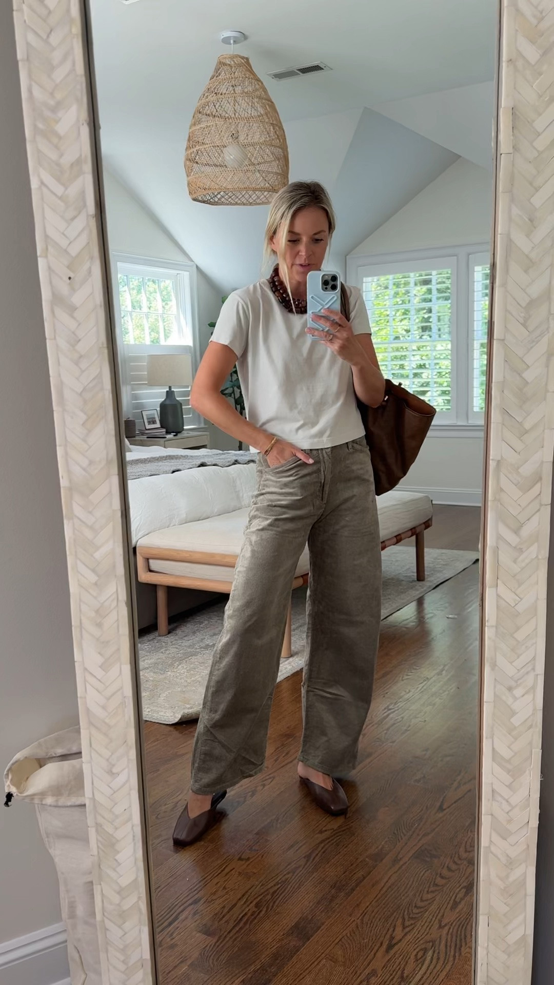 These moss green corduroy pants are going to be on repeat this fall! 
•I’m 5’5 wearing a 26R,tts 
•small tee, tts 
•mules fit tts