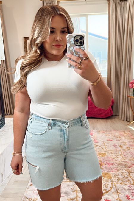 curvy spring denim shorts look! wearing size xl in fitted white cropped tee and size 32 in light wash distressed mid length shorts 

#LTKunder50 #LTKcurves #LTKSeasonal