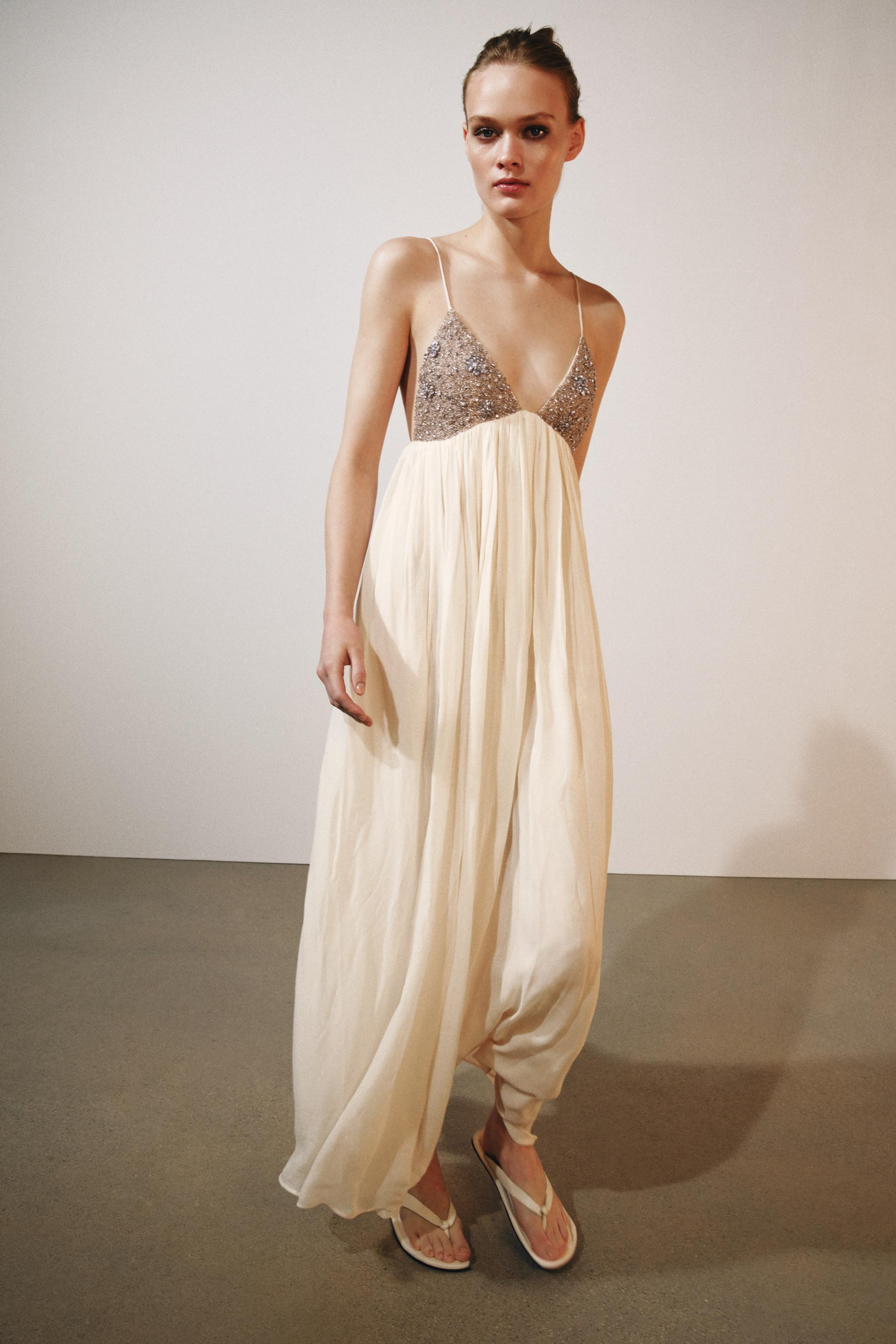 ZARA WOMAN COLLECTIONDress with main fabric made of spun viscose. Featuring a V-neck and straps. ... | Zara UK