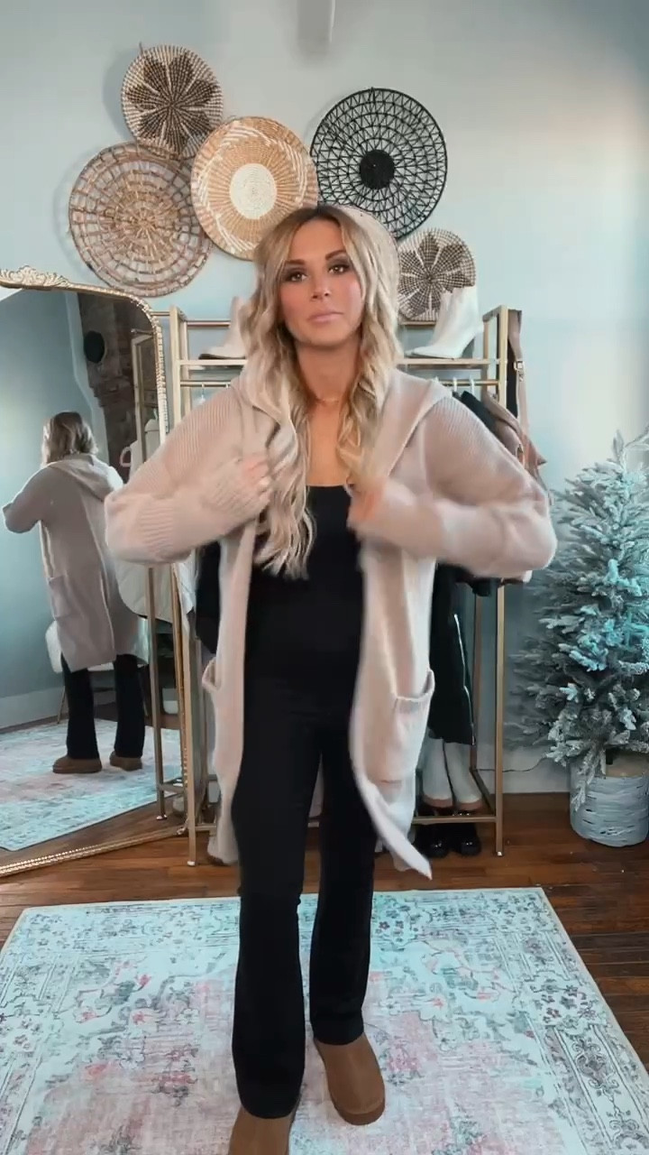 Travel this winter in style & comfort with two best selling pieces currently on my Amazon storefront!✈️ I wear this jumpsuit on repeat and love that it can be worn casual or a little dressed up! I am 5’6 135lbs wearing a size medium in the jumpsuit, small in the cardigan and true size in shoes. Black jumpsuit, amazon outfit, long cardigan, travel outfit, cozy outfit, airport outfit

#LTKfindsunder50 #LTKtravel #LTKSeasonal