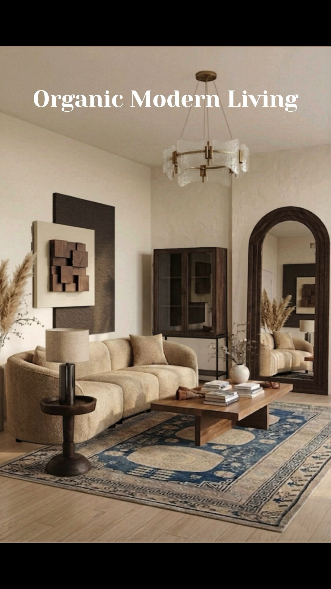 organic modern living room, curved beige sofa, dark wood arched floor mirror, vintage blue area rug, neutral home decor, modern glass chandelier, 3d wood wall art, warm minimalist aesthetic, rustic wood coffee table, tall display cabinet

#LTKHome