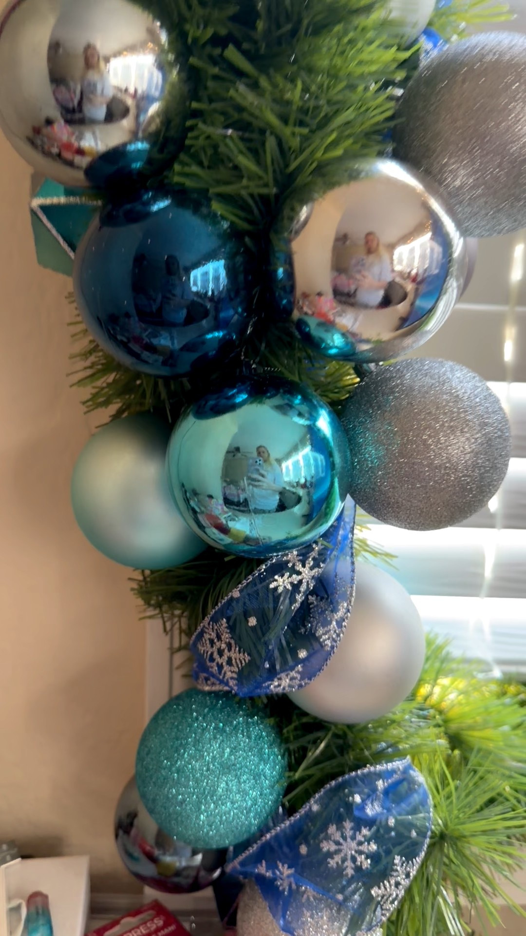 I am so proud of this little diy! All I did was find old christmas ornaments we haven’t used in years garland ribbon, and tacks!  WHAT?! Yes, not hot glue gun or anything, take parts of the garland and cut it and then put the ornaments on the garland and tacked it to the wall  then wrapped a little more garland and added ribbon as needed! I also tacked some of the ornaments on to make it look fuller.  I’ve never done anything like this. So for my first time, I feel like I did pretty good! 🫶🎅🏻🎄♥️💚 holly jolly merry christmas happy holidays! Anyone else do any diy Christmas decorations?!

#LTKdayinmylife #LTKHoliday #LTKSeasonal