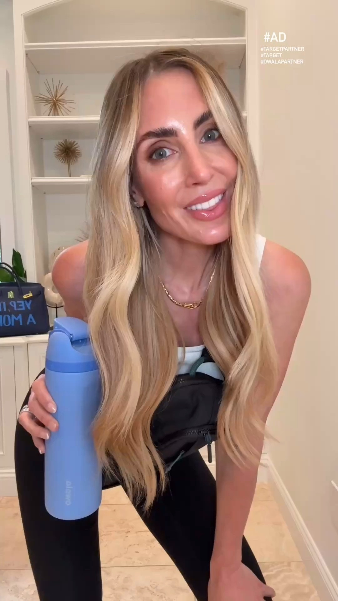 #AD I have gotten so many questions from my girlfriends about my bag and water bottle, and this is why! Owala seriously created the ultimate mom bag. It keeps your water bottle right where you need it while leaving your hands completely free for everything else! Whether you're chasing kids, running errands, or headed to a ball game, this is a must have.  
Comment YES PLEASE and I'll send you the link! 🤍@Target @Owala #TargetPartner #Target #OwalaPartner @shop.ltk #liketkit