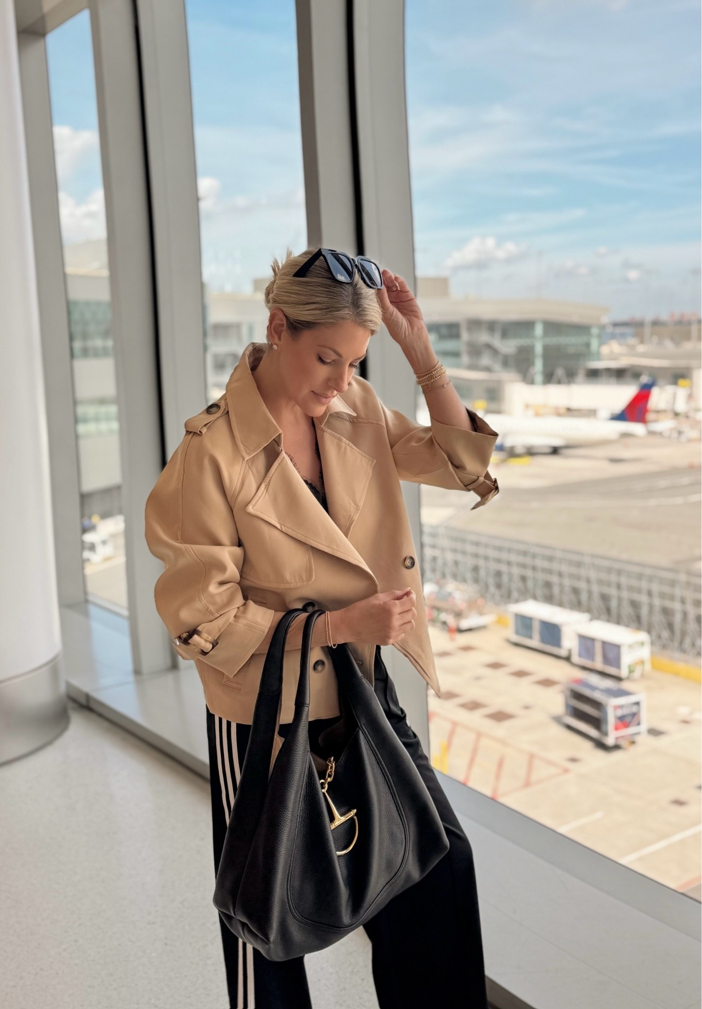 Comfortable, but still SO cute ✈️🤎 This is officially my second time flying in these pants, and honestly… I’m planning more trips around THEM. 😂 They are that comfortable!

The perfect travel-day pants when you want to feel cozy without looking like you rolled out of bed. Paired with a few easy layers, this whole look feels effortless, pulled together, and airport approved.

Linking my entire travel outfit here! ✈️

#LTKNYFW #LTKootd #LTKTravel