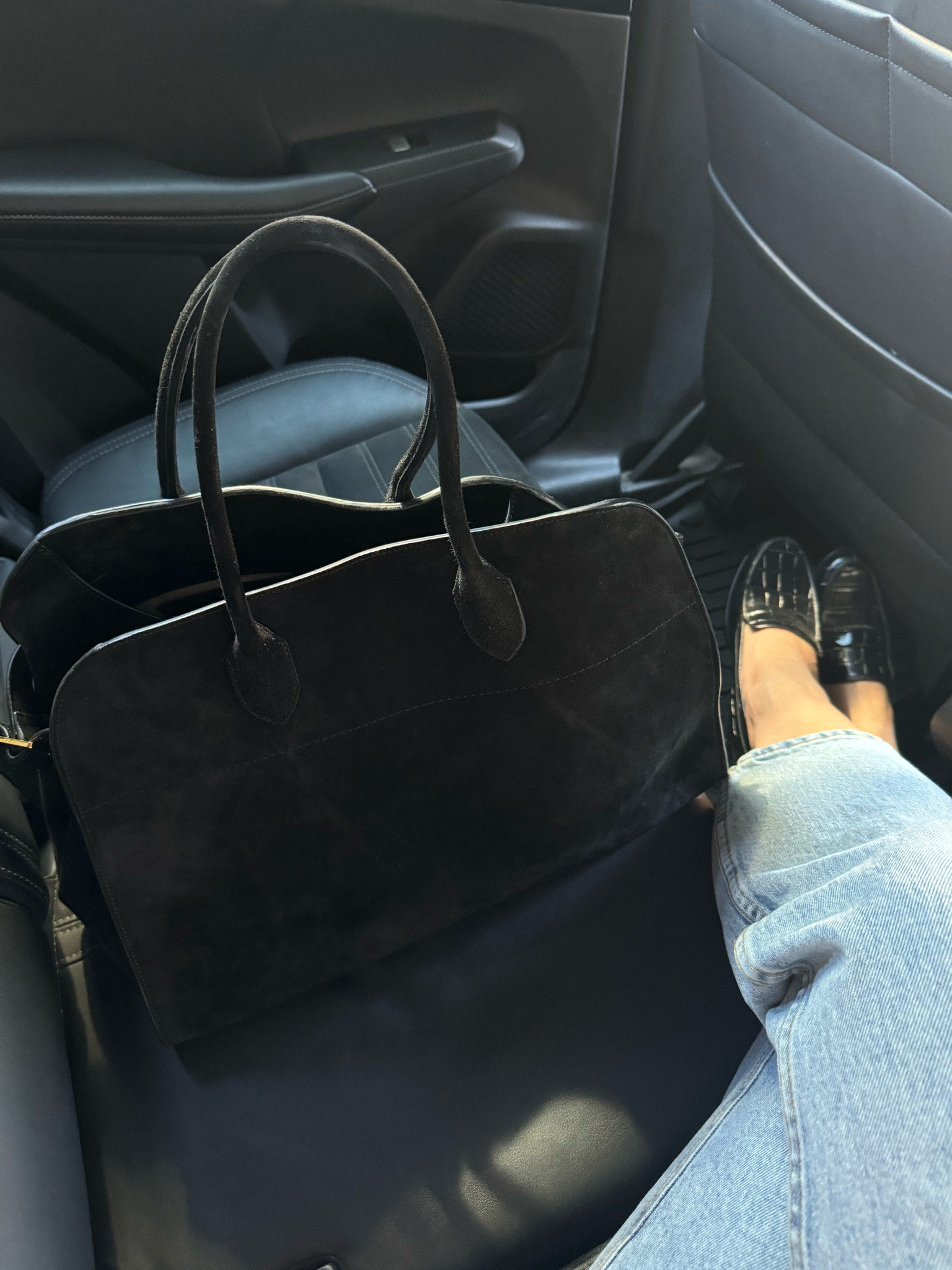 The most stunning Emme Parsons loafers. They run TTS. They're comfortable but require a few wears to reach optimal level.  My bag is The Row but the one I'm including from Little Liffner is the large suede bag I'd get if i was in the market. 