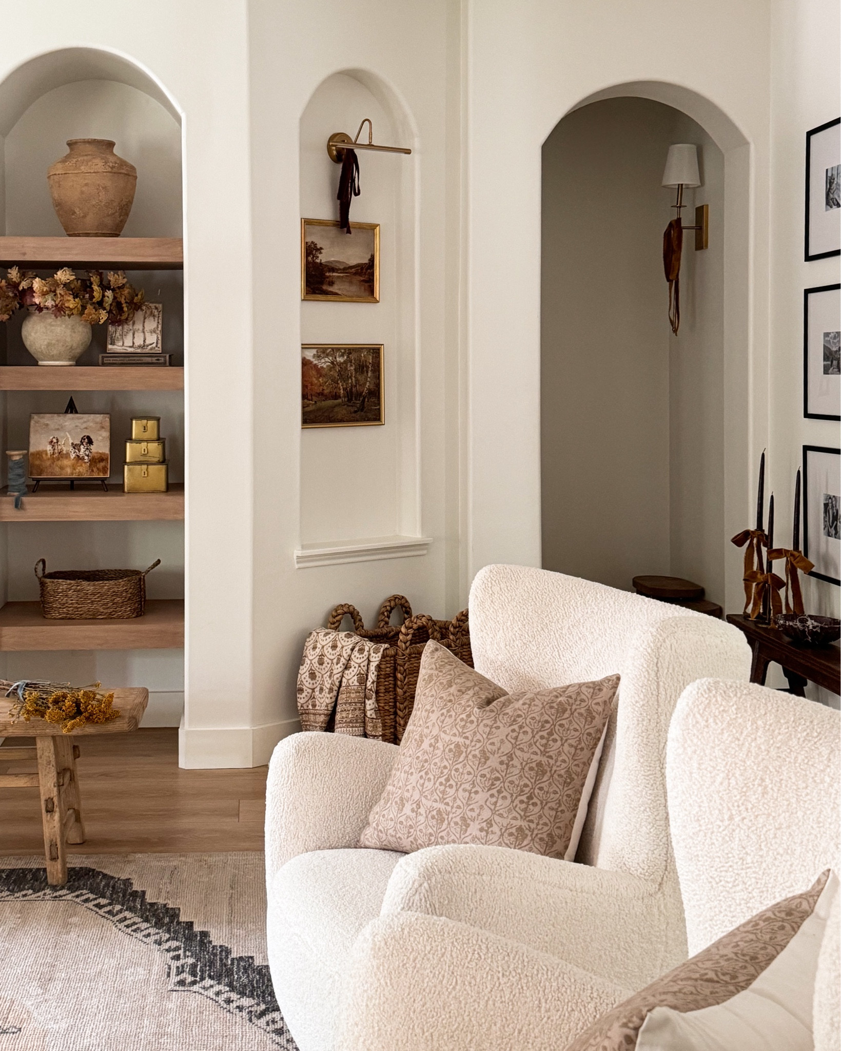 Autumn Living Room Reveal Part One! 🍁

Floating Shelves, Shelf Styling, Fall Shelf Styling, Vintage Prints, Fall Prints, Fall Stems, Boucle Chairs, Swivel Chairs, Neutral Throw Pillows, Brass Sconce, Picture Frame Light, Velvet Ribbon, Gallery Wall, Black Matted Frame, Large Basket, Niche, Rustic Vase, Affordable Stems

#LTKSeasonal #LTKHome #LTKFindsUnder50