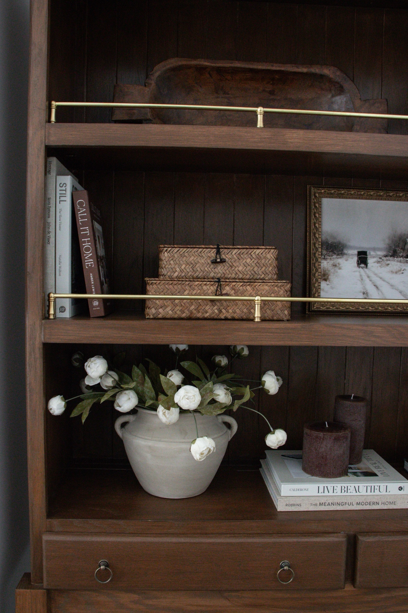 Added brass gallery rails to this cabinet to elevate it to designer level! 