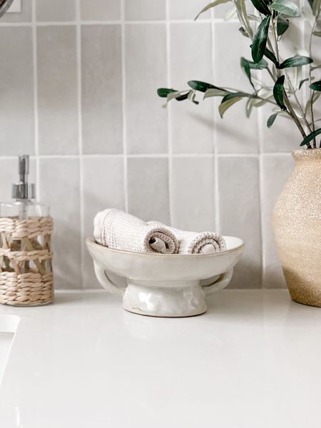I’ve been using this cute ceramic bowl to hold my hand towels as bathroom decor and I love it! It could also be used in your living room decor or kitchen decor. It gives the organic modern vibe that I love. 

#LTKunder50 #LTKhome