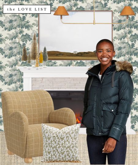 Create a wintry feel with dark blue green and camel hues. Iconic Scalamandre Raphael botanical wallpaper pairs with a checkered rug, linear pendant light, green floral pillow, and curvy accent chair. The electric fireplace, bottle brush trees and contemporary photo print anchor the look. 

#LTKhome #LTKSeasonal