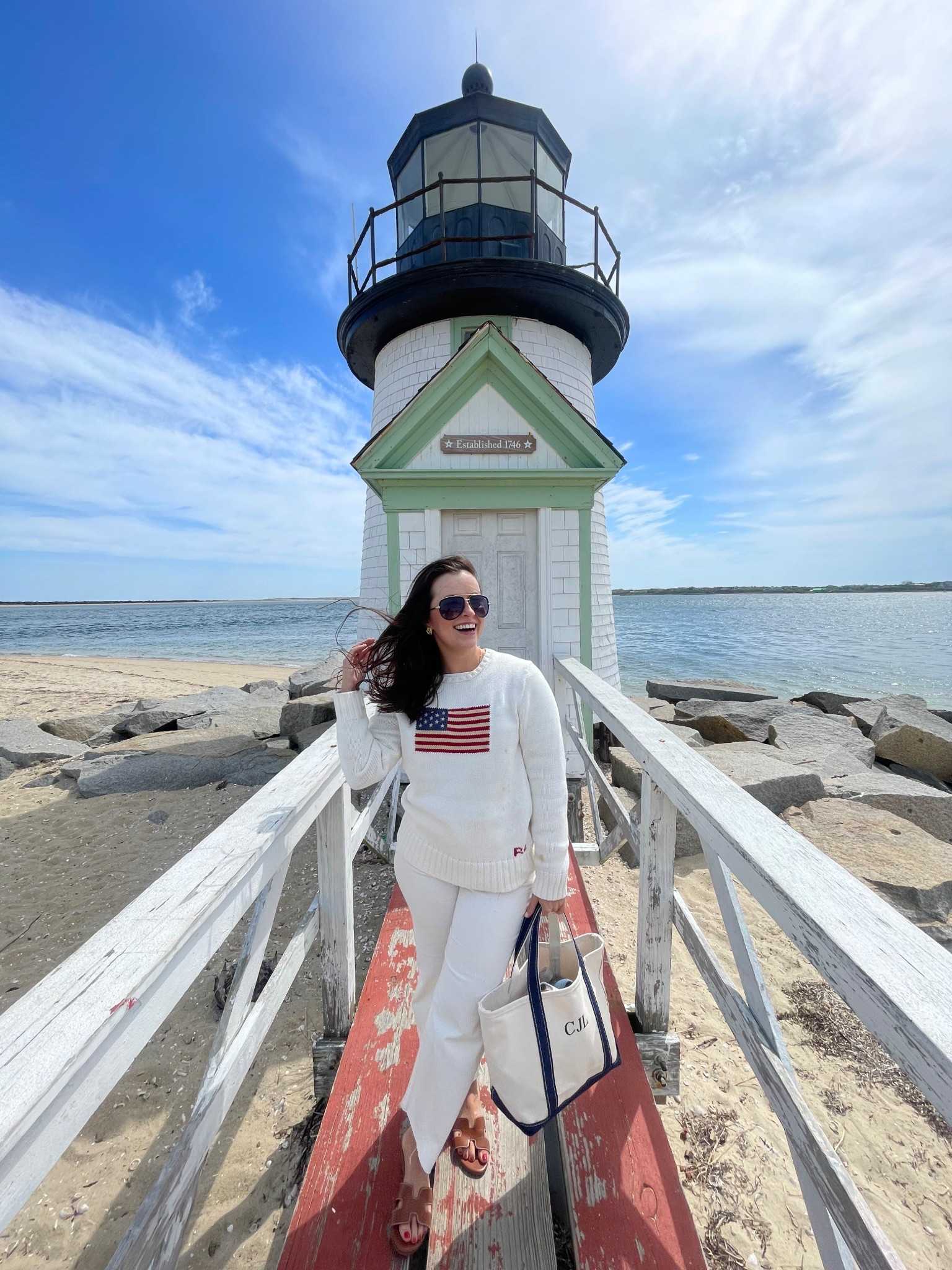 The ultimate Nantucket vacation outfit: Ralph Lauren flag sweater + LL Bean boat and tote + Brant Point lighthouse ❤️🌊🇺🇸

What to wear in Nantucket
New England summer
Vacation outfit idea 
Nantucket casual day outfit 
Nantucket dinner outfit 

Tip: I took a Boys XL in this RL sweater. If you’re petite, you can totally fit in a boys L or XL and save some $$. Linked the women’s version as well and a few other options at multiple price points 

#LTKTravel #LTKStyleTip #LTKSeasonal