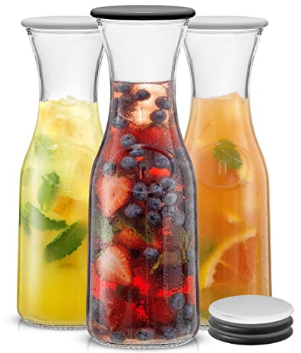 JoyJolt Glass Carafe with Lid, Set of 3 – 1 Liter Glass Pitcher for Mimosa Bar, Water, Iced Tea, Juice, Wine, Lemonade, Milk – Dishwasher Safe Beverage Drink Dispensers for Brunch, Parties | Amazon (US)