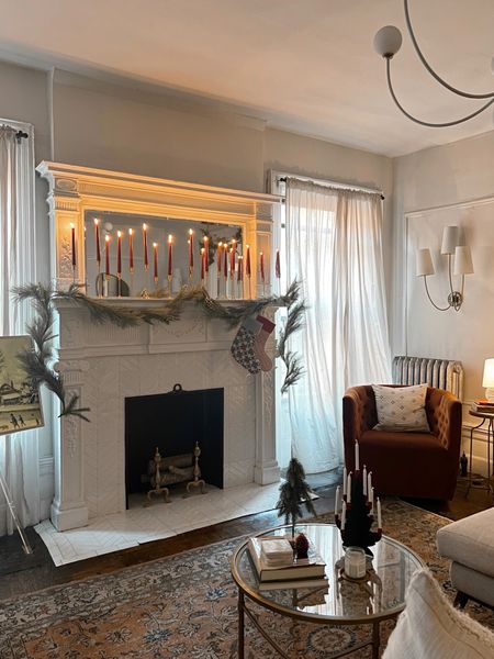 Christmas decor- garland, candle sticks, candles, chair, coffee table, living room 

#LTKSeasonal #LTKHoliday #LTKhome