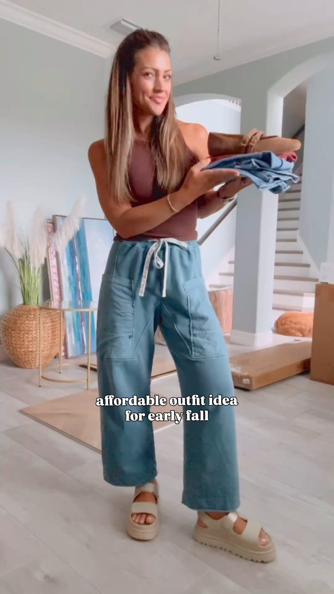 For all my girls who have been requesting outfit ideas that feel like fall even when it doesn’t *quite* feel like fall 😆 I got you!!! ♥️ this is perfect for a lot of us who live in warmer climates— you can’t beat all of these neutral staples that you can rewear all fall long. And if it’s going to be chilly where you live soon, just add a cardigan! I’ll link the one I own that I would pair with this fit. I’m wearing my true size S in this top (LOVE!) and a 0 in the jeans — size down! Even the 0 is still baggy and roomy which I looooove. I decided to cuff at the end because sometimes having shorter legs feels more flattering to show some ankle! For reference: I’m just about 5’4 in regular length. #falltransition #falloutfits #outfitideas4you #affordableoutfits 