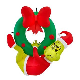 Dr. Seuss 4 ft Grinch Hanging From Wreath Holiday Inflatable 22GM14290 - The Home Depot | The Home Depot