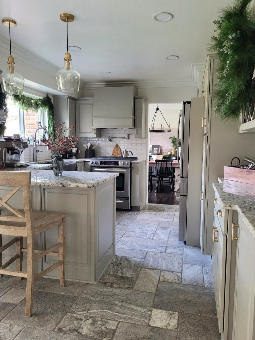 Kitchen holiday decor - I kept kitchen Christmas decor simple with  9 ft real touch garland over the window, a mixed greens wreath,  and faux arrangement!

#LTKHome #LTKHoliday
