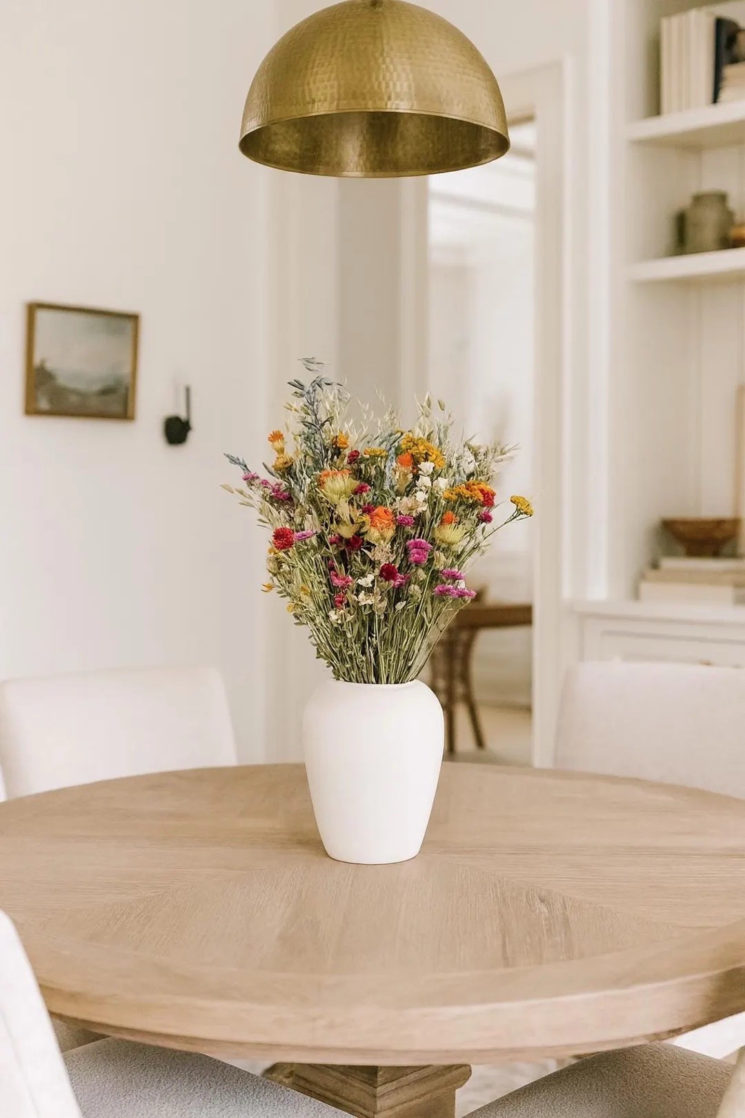 A beautiful blend of color and texture, this dried bouquet features safflower, lemon mint, avena oats, globe amaranth, yarrow, and delicate ammobium daisies for an artfully wild yet elegant look. Soft movement from the oats pairs perfectly with vibrant pops of pink, purple, and golden tones, creating a timeless arrangement that works in any season. Perfect for shelves, coffee tables, or gifting, this bouquet brings long-lasting beauty and natural charm to your home.

#LTKHome #LTKStyle #DriedFlowers #HomeDecorInspo #FarmhouseDecor #CottageStyle #WildflowerDecor #ColorfulDecor #TimelessDecor #NeutralHome #ShelfStyling #GiftIdeas #DriedFlowerBouquet

#LTKSeasonal #LTKWedding #LTKHome