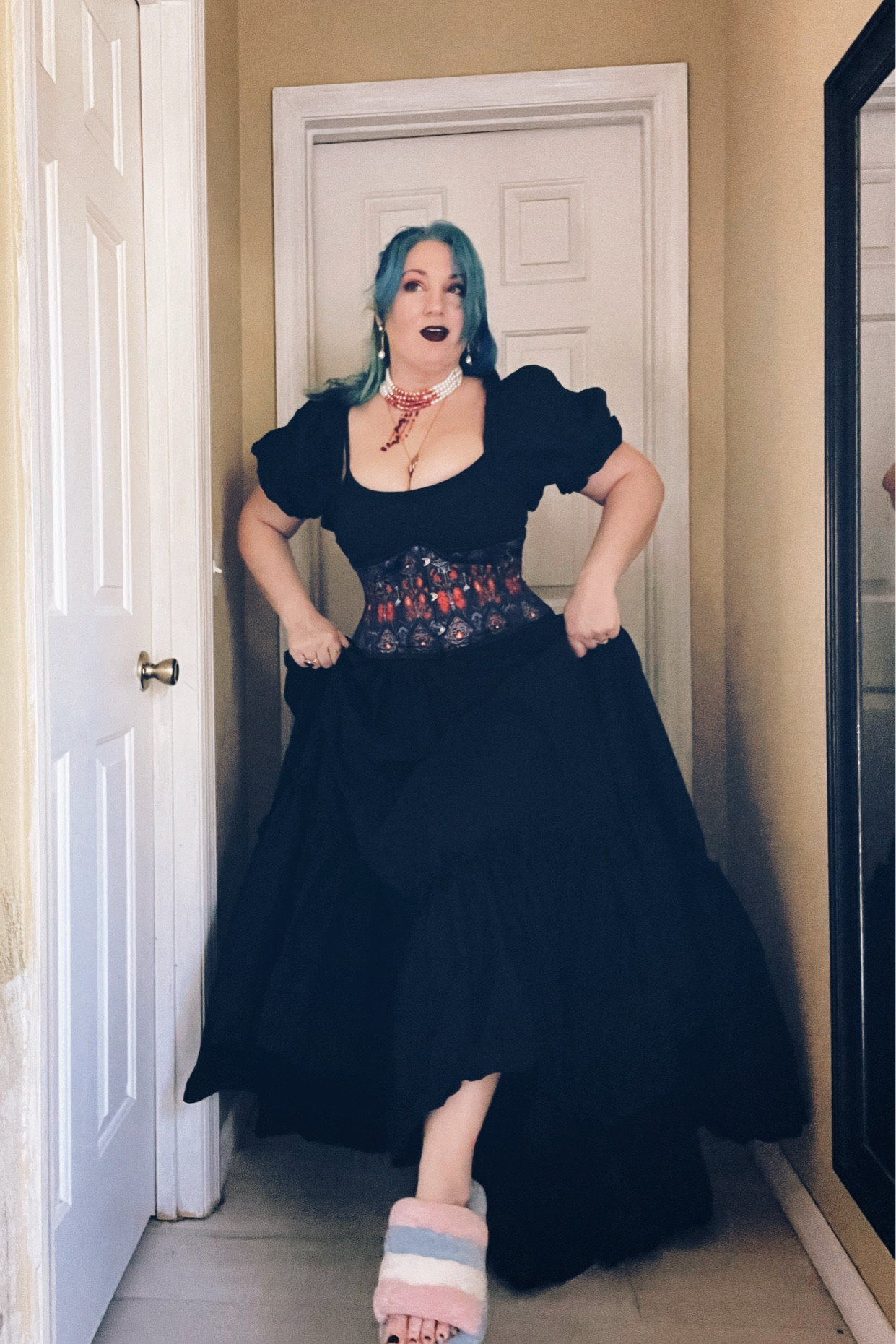 Hello friends and void! I have the opening song from Farscape stuck in my head! Yay!
Anyone else watched Farscape? 
And look, under every Vampire’s ball gown is a pair of comfy slippers or uggs. 🤣 like these! 
Also wearing my new corset bought from @draculaclothing 🥰🥰🥰🥰 
#dopaminedressing 
#uggs
#selkiedress
#draculaclothing
#dressoftheday
#outfitinspo
#vampire

#LTKStyleTip #LTKOver40 #LTKMidsize