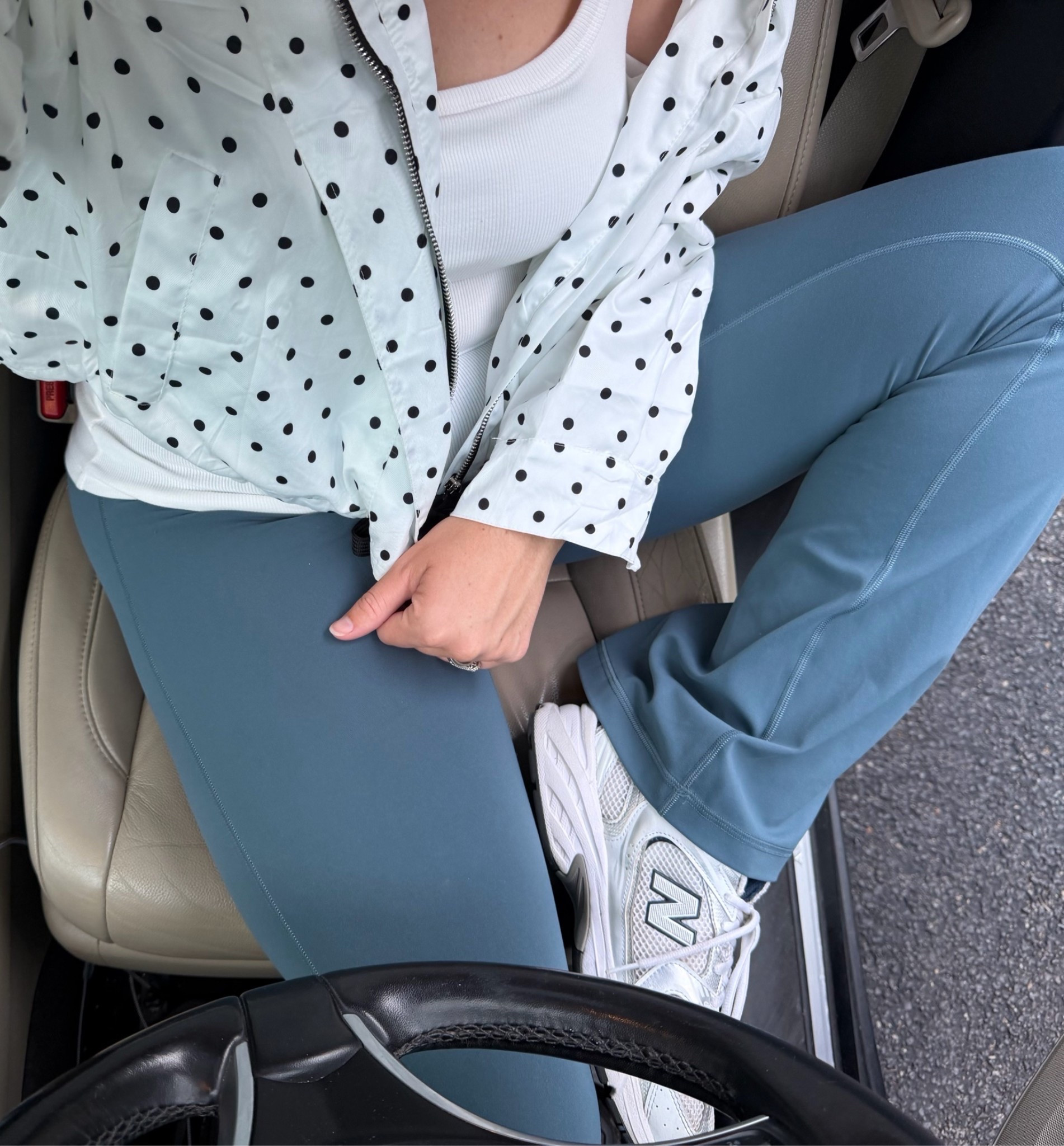 CUTEST polka dot (black and white) zip up windbreaker! 🖤🤍

Wearing: my fav Amazon Colorful Koala blue flared leggings + a white tank (with a built in bra) + the best New Balance tennis shoes!!