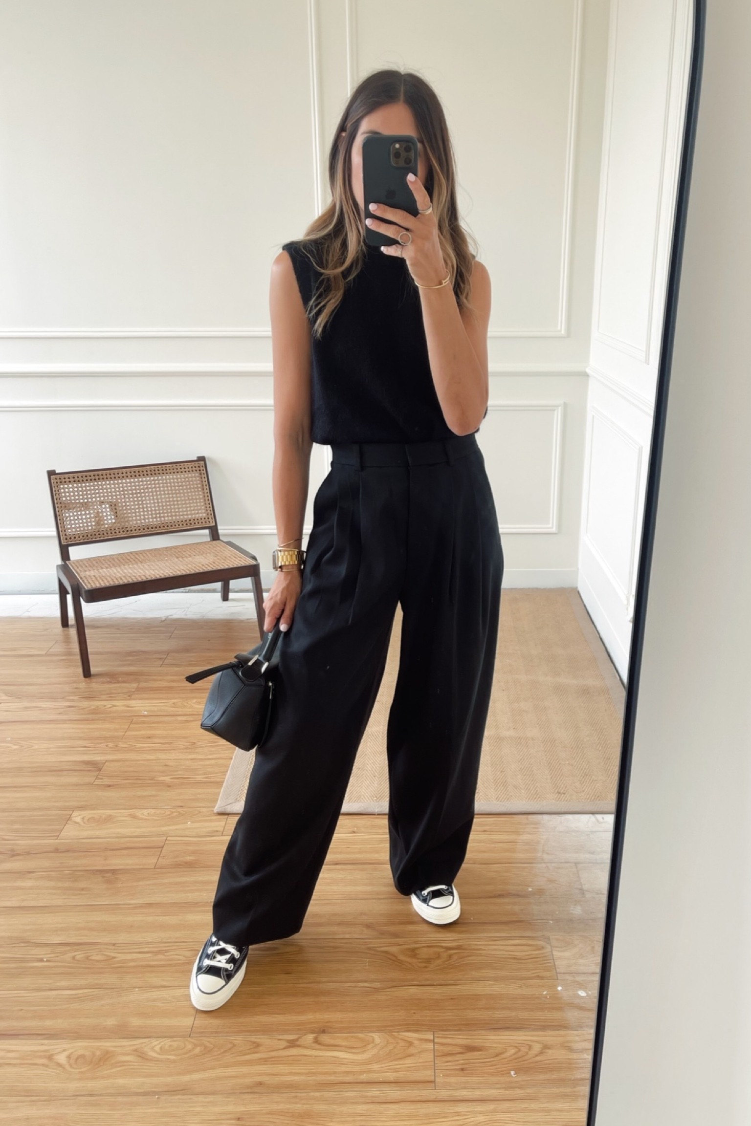 An all black outfit isn’t always boring and drab! Using the right shapes and materials creates a more interesting silhouette 🖤

#LTKfit #LTKSeasonal #LTKstyletip