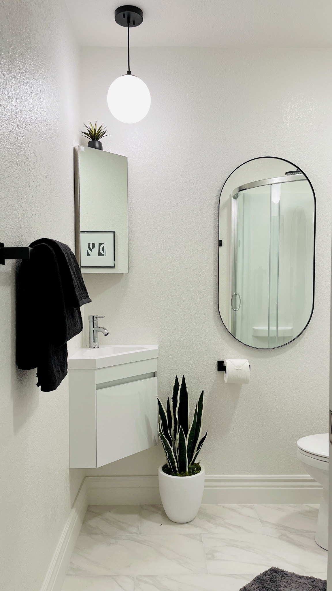 This budget friendly renovation turned out beautifully. Sourced most of the items from Amazon! The corner vanity was a great solution for a tiny 5x6 bathroom! 
#modernbathroom #vanity #bathroomrenovation #amazonhome

#LTKunder100 #LTKhome #LTKSeasonal