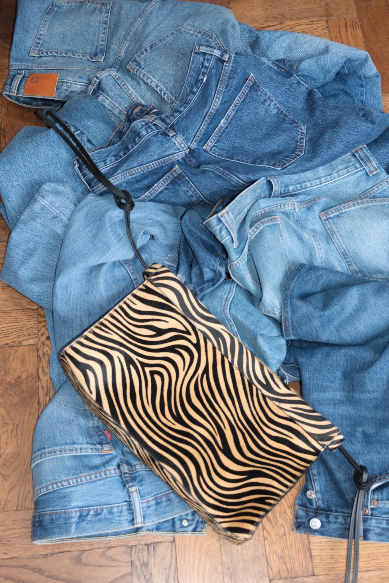 Animal Print Clutch Bag + Denim Jeans 

#LTKjeans #LTKspring #LTKeurope