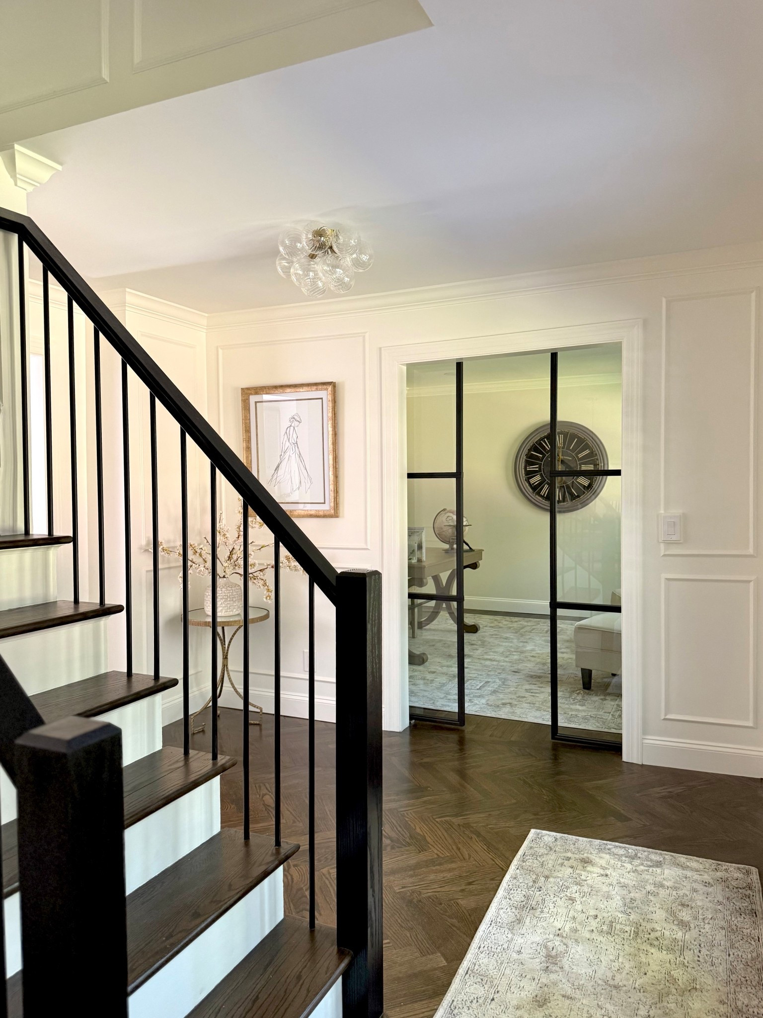 Foyer views at our Long Lond Project! 

Love the bubble light for this entry and the statement clock in the office - that one is discontinued but I linked similar


