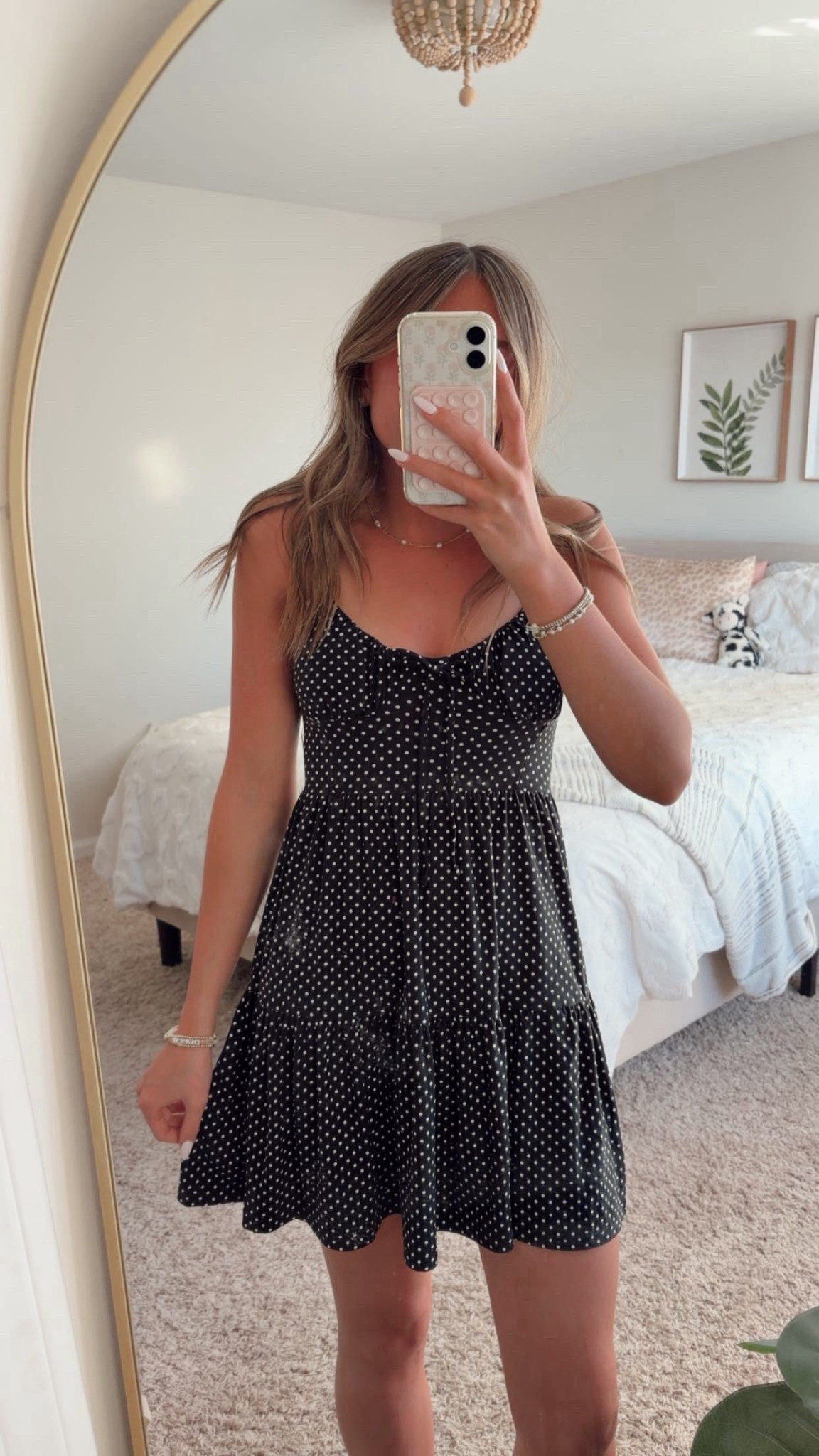 Cutest spring dress selection at Walmart! If you need a cute mini dress for any occasion, they have it! this one is black with white polka dots and has a cute cinched top, adorable. I am wearing an xs and it is the perfect fit and length, buy these affordable dressed for this spring, summer, or any vacations in the future! 

 #walmartfind #springdress #ltkootd #affordableoutfit #summeroutfitinspo #LTKdayinmylife #LTKootd #LTKTravel