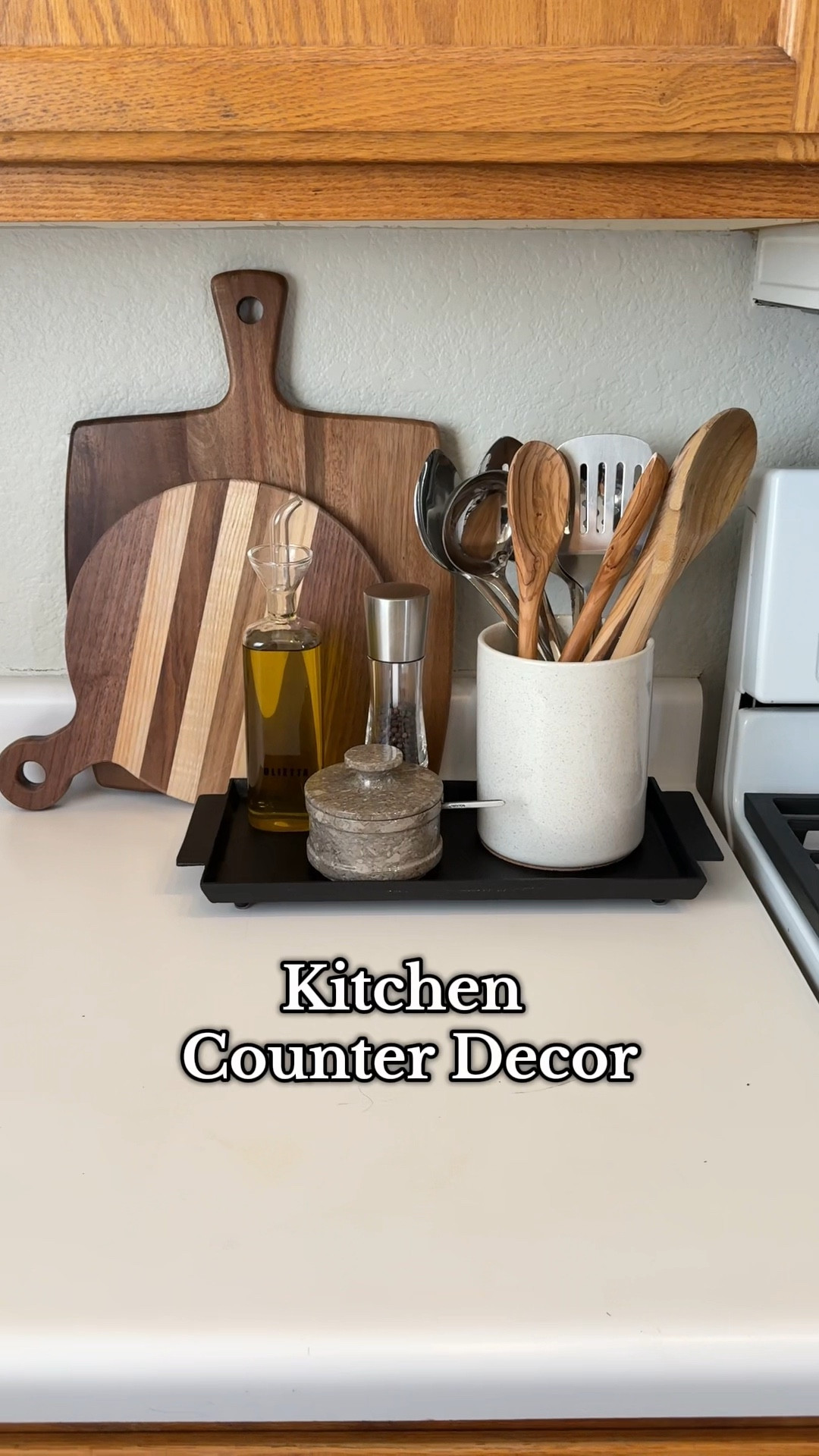 Kitchen counter decor! This stylish and functional kitchen counter styling keeps your essentials accessible all while adding a decorative touch to the space. 
I absolutely love this marble salt cellar!! It comes with a teaspoon that fits perfectly into the dish with the lid on. 
•••
Kitchen essentials, Amazon home, Amazon kitchen, kitchen styling, kitchen decor, kitchen counter, kitchen utensils, olive oil dispenser, olive oil bottle, pepper mill, vintage cutting board, decorative cutting board 

#LTKHome #LTKWatchNow