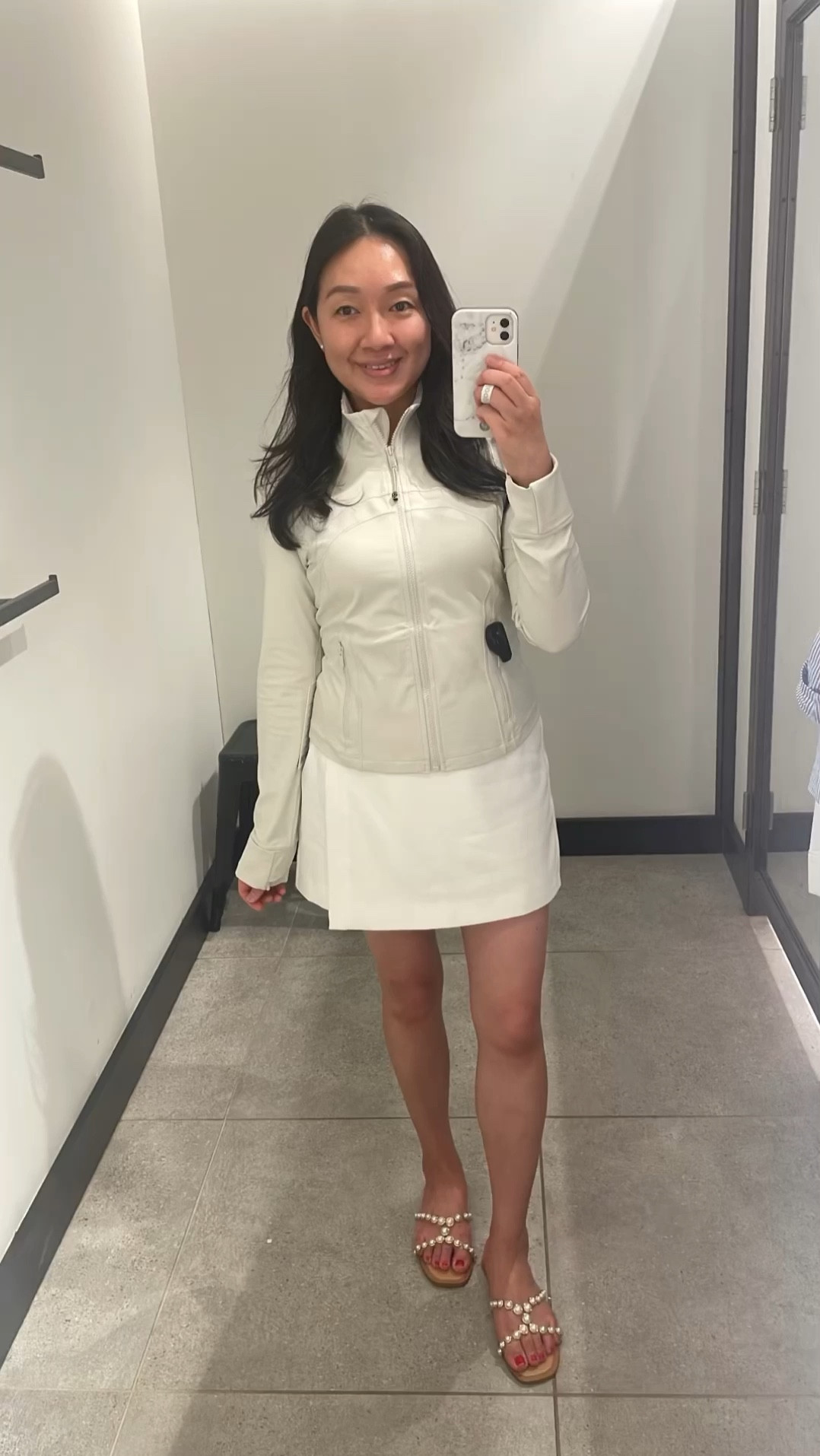 Lululemon Define Cropped Jacket Nulu in size 10 for a body skimming fit. The sleeves are very long. I also tried on size 12 for comparison which was looser so I prefer the fit of size 10. For size reference I'm 5' 2.5" and 115 pounds.

White skort is size XS from Amazon The Drop.

#LTKActive #LTKFitness #LTKOver40