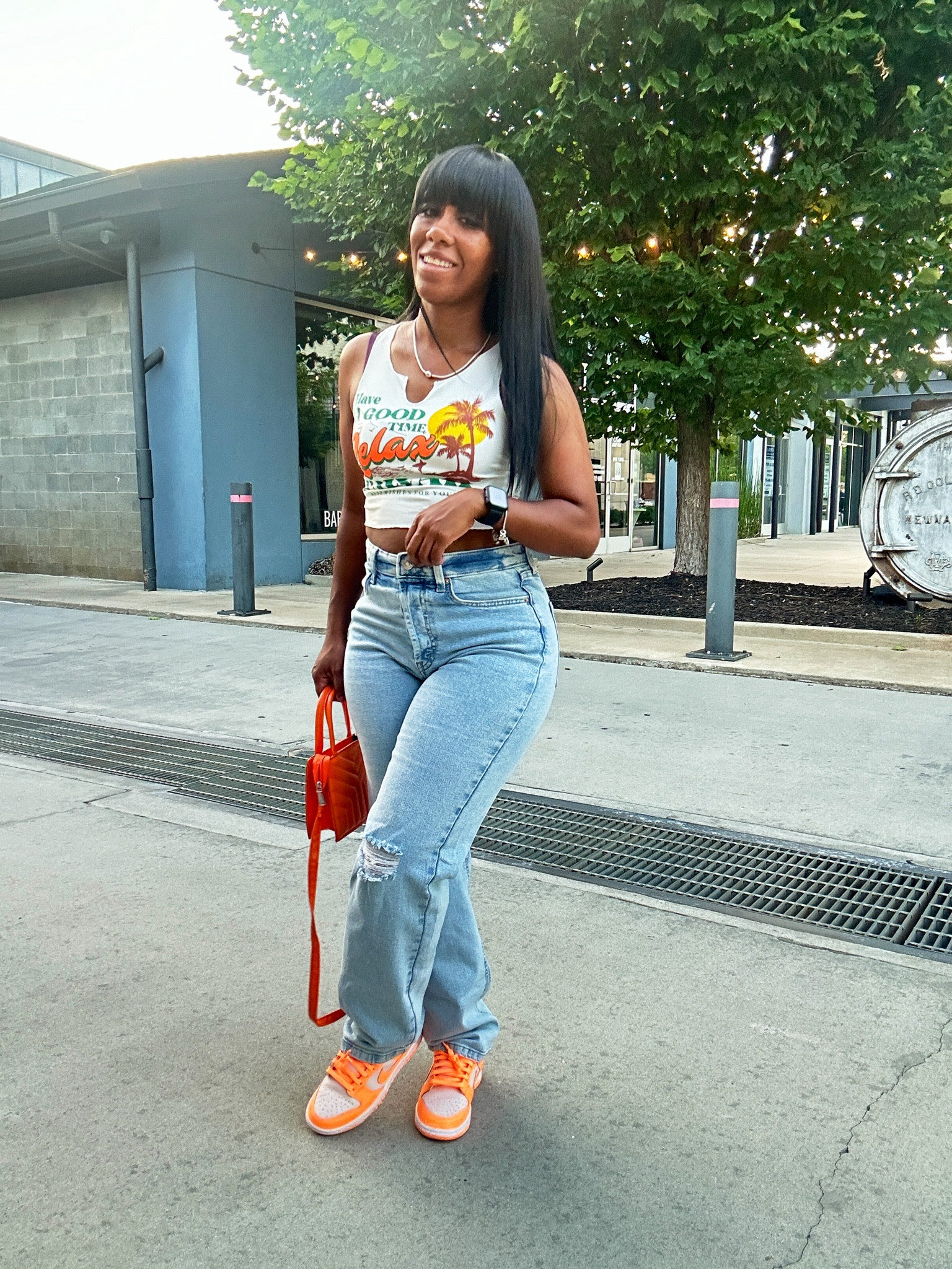 Back to school outfit idea.

Graphic tee tank with high rise distressed jeans.

I styled this casual outfit with a orange crossbody bag and Nike dunk low peach cream sneakers.

#LTKFindsUnder50 #LTKShoeCrush #LTKBacktoSchool