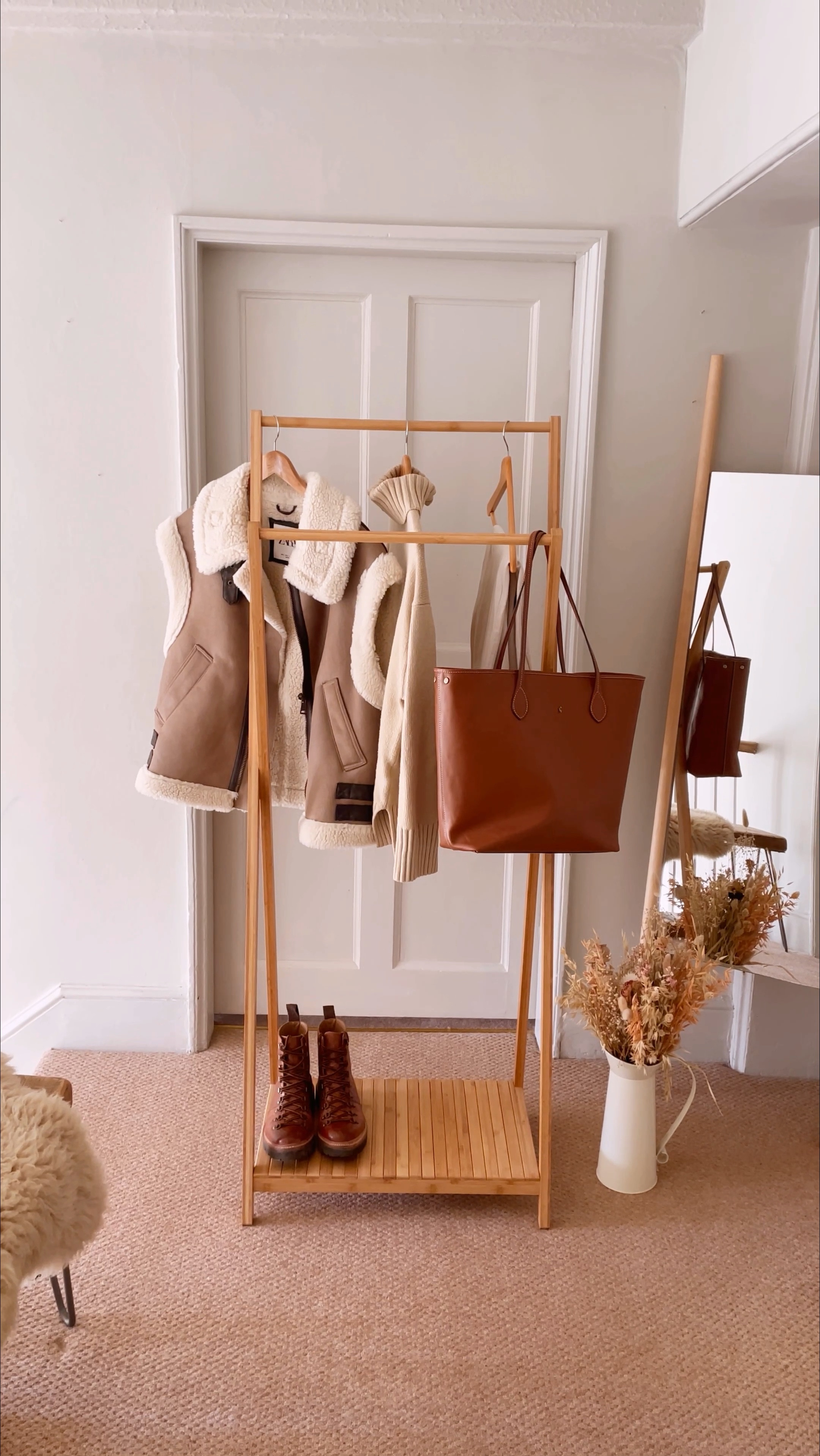 Neutral outfit idea aviator gilet tote bag Grenson boots roll neck white jeans 

#LTKSeasonal #LTKFind #LTKeurope