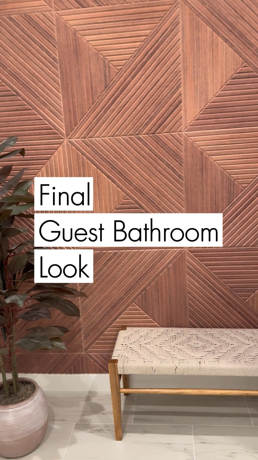 My final guest bathroom look! Love his this turned out and the stick on faux wood wall was just the right touch! 