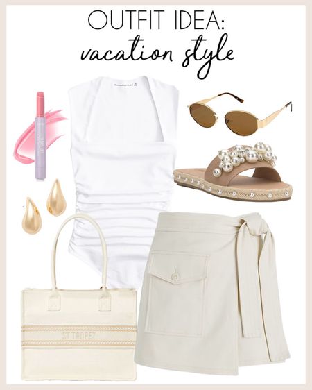 Neutral vacation outfit idea! 

#vacationstyle

Neutral spring outfit. Neutral vacation outfit. Neutral skirt. Pearl embellished sandals. Target finds. Target beach bag  

#LTKfindsunder100 #LTKstyletip #LTKSeasonal