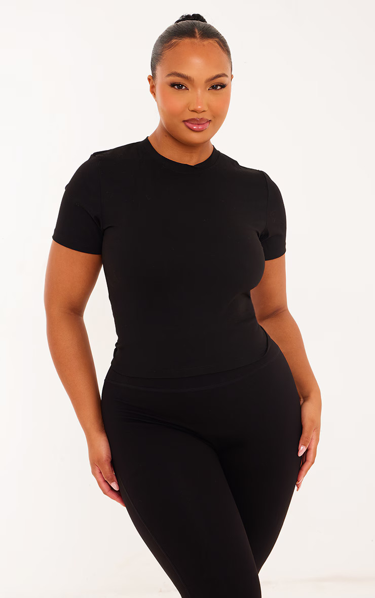 Plus Black Sculpt Longline Short Sleeve Gym Top | PrettyLittleThing US