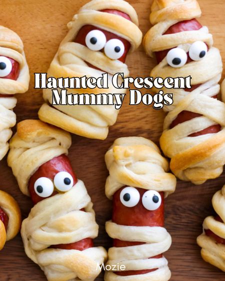 One thing about us is that we can’t get over cheesy Halloween party snacks.👻

These Haunted Crescent Mummy Dogs take literally 15 minutes to make and look so stinking adorable! 

ALL YOU NEED IS:

• Sausage Links
• @pillsbury Crescent Rolls
• Candy Eyeballs
• Ketchup + Mustard (for dipping)

Check out this recipe and other fun Halloween and fall recipe ideas on our blog (mozielife.com)!

#LTKSeasonal #LTKparties #LTKHalloween