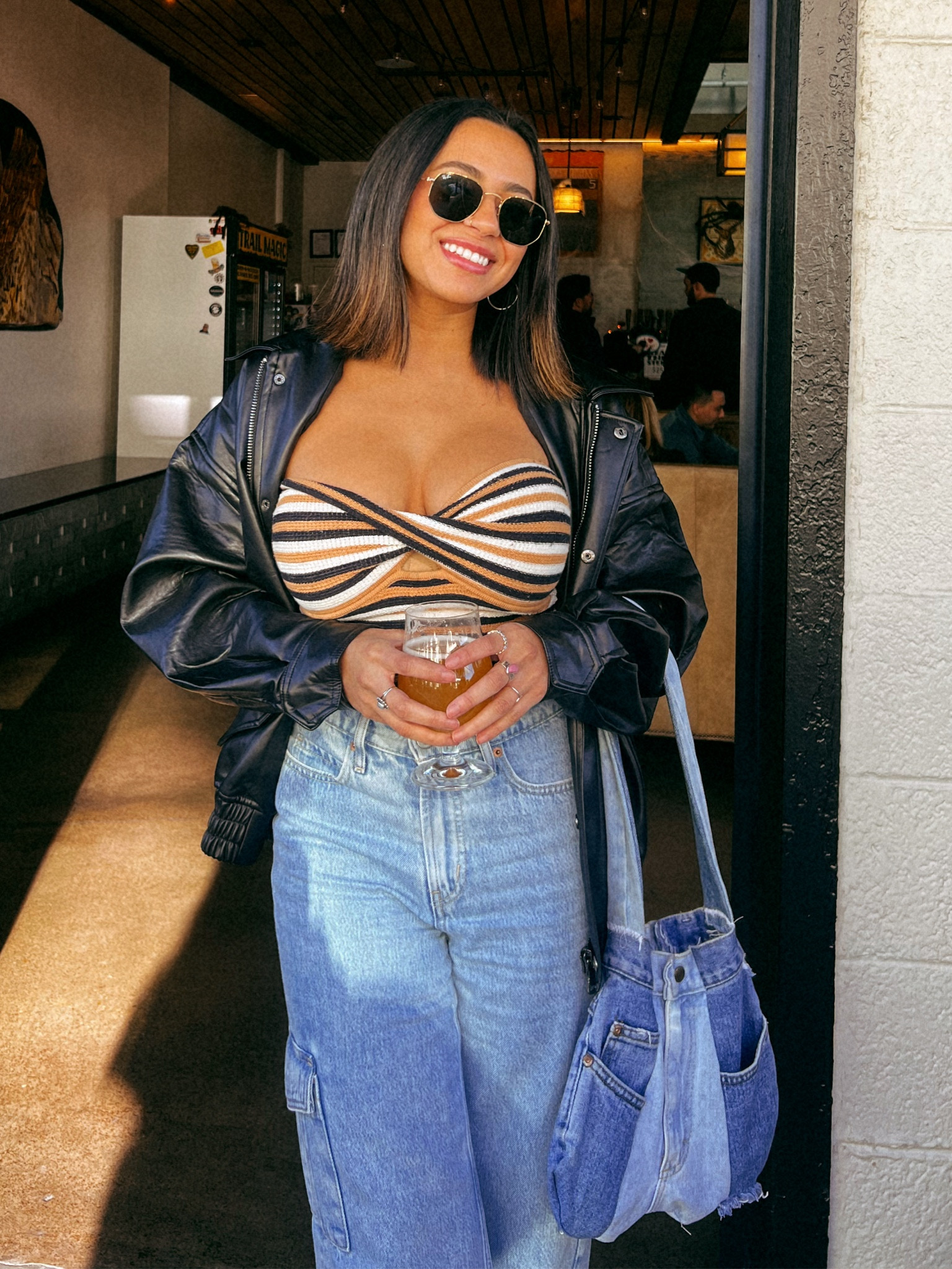 hexagonal raybans, PP bomber jacket in. xxs, AE twist tube top in xs, old navy/gap baggy wide leg cargo jeans in size 0 🥳 #bdayfit #leatherjacket #princesspolly #rva #virginia #rayban #oldnavy 

#LTKSeasonal