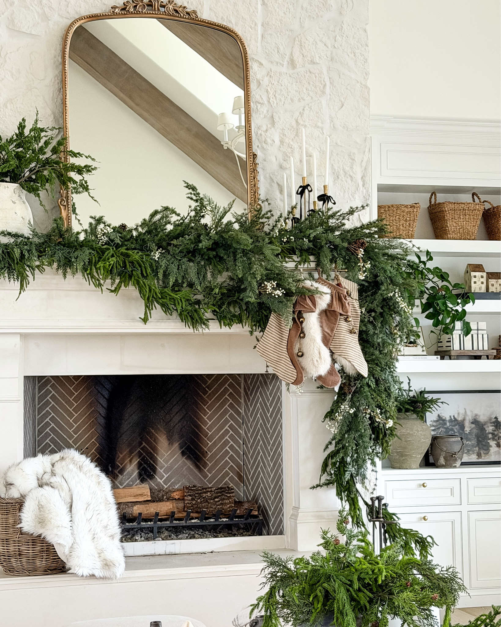 Holiday in full swing!  #Pillow covers #garland #wreaths #slipcoveredsofa #swivelchairs #stockings #blankets #baskets #pots

#LTKHome #LTKSaleAlert #LTKHoliday