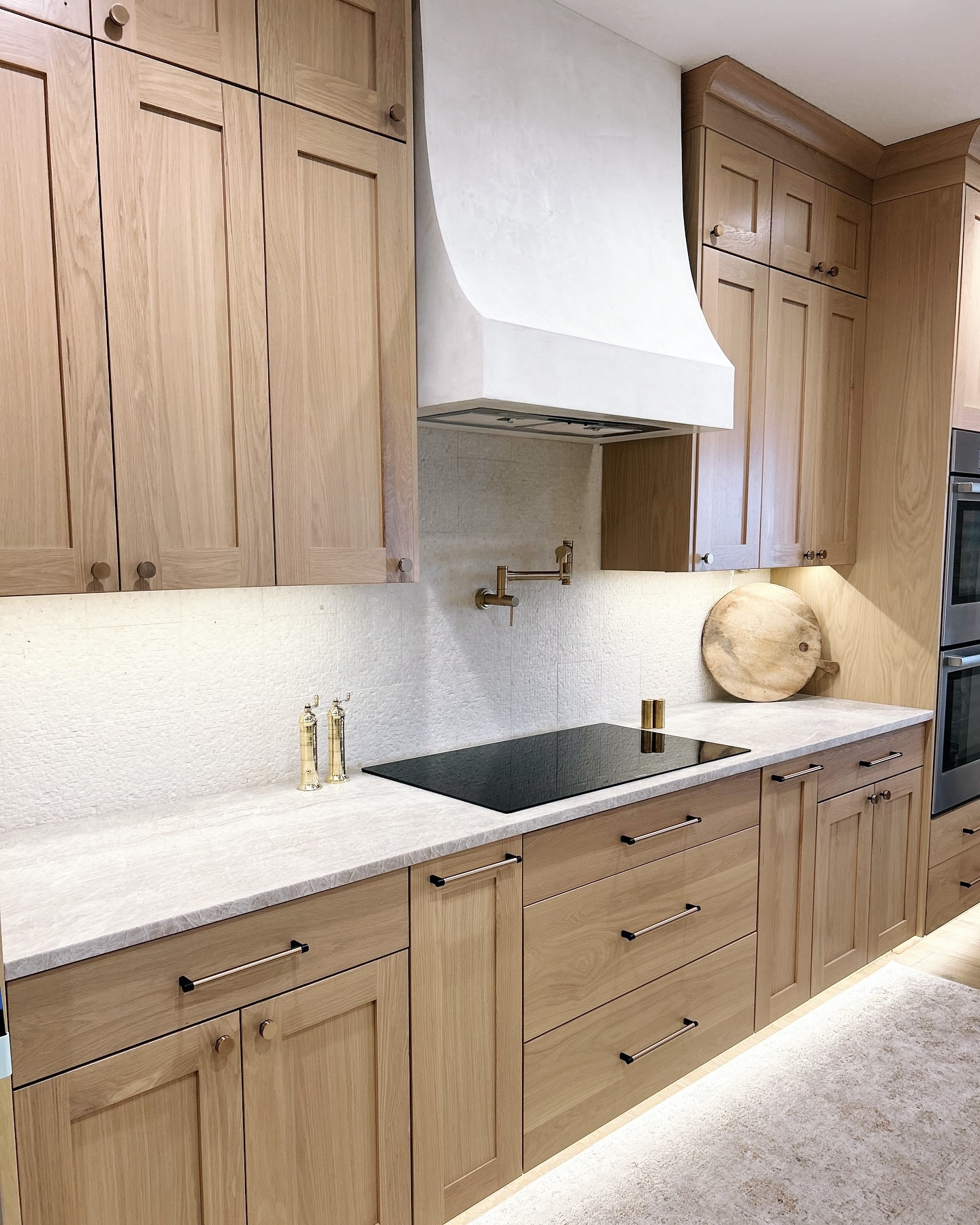 From Chaos to Class: A Kitchen Transformation

This kitchen is unrecognizable! What once felt like cramped and inefficient spaces has become a warm, functional, and beautifully designed home.

Before: The layout made cooking feel chaotic, with limited storage and a lack of flow and so many extra walls. The materials and finishes felt outdated and didn’t reflect the homeowner’s style or needs.

After: We completely reimagined this kitchen by moving the pantry adding custom cabinetry for smarter storage, seamless lighting for ambiance (just look at the differences in tone due to lighting limitations with the previous layout), and refined finishes that bring warmth and elegance. Now, it’s a space where every detail has a purpose—and the homeowner can truly enjoy cooking and gathering here (a joyful change from the previous kitchen or the garage cooking during the remodel) iykyk

Swipe to see the dramatic before-and-afters!

Ready to transform your kitchen? Let’s make it happen.