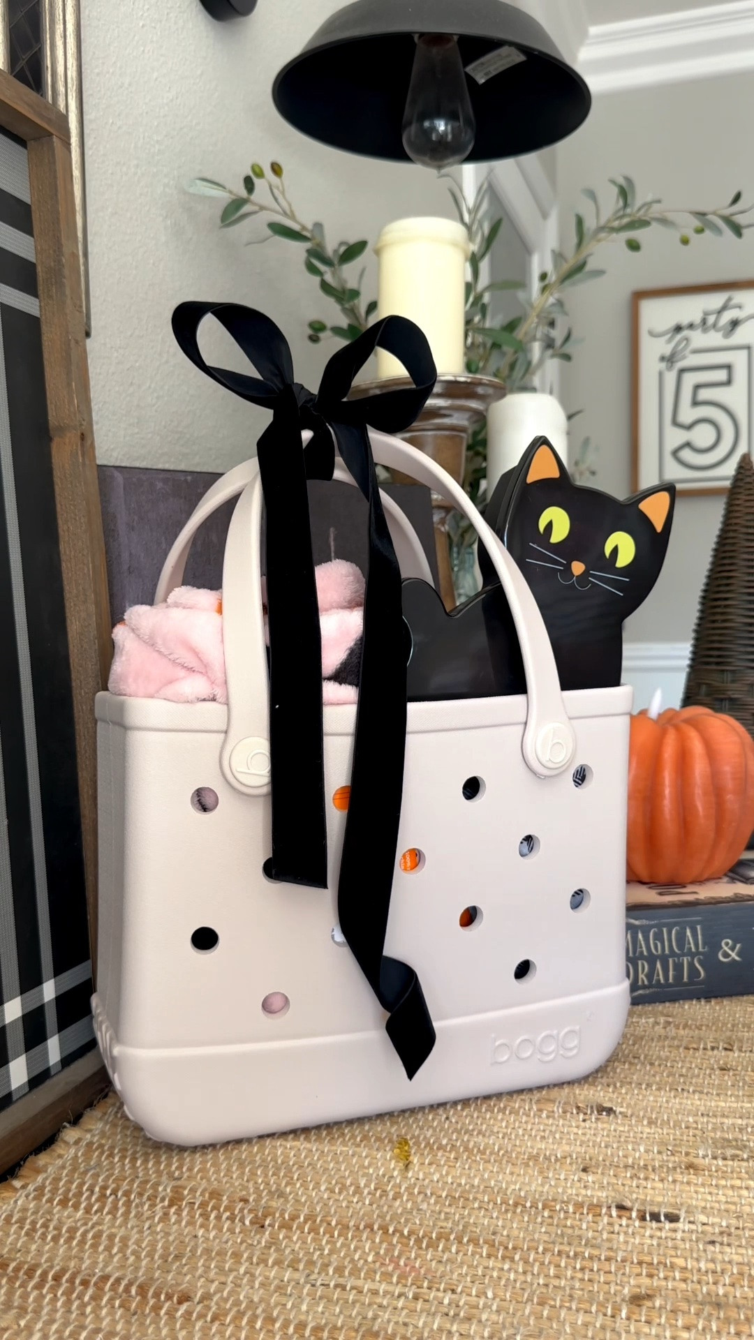 Loving this Halloween gift! The Bogg Bag is the perfect way to gift this! The black cat container is so fun too🐈‍⬛ Added in a cozy blanket & a little self care. I cannot wait to gift this!🖤🧡🖤🧡

#LTKSeasonal #LTKHome #LTKBeauty