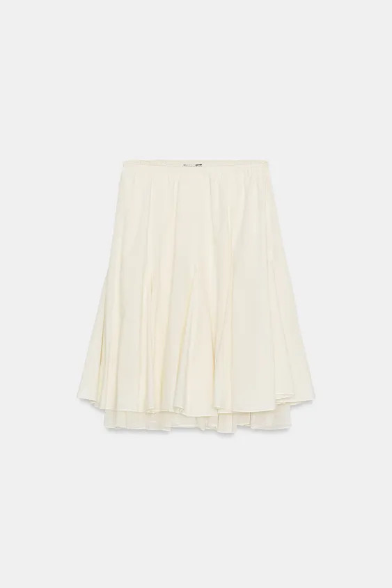 Mid-waist skirt with an elastic waistband, gore detailing and a double-layer hem in a contrasting... | Zara UK