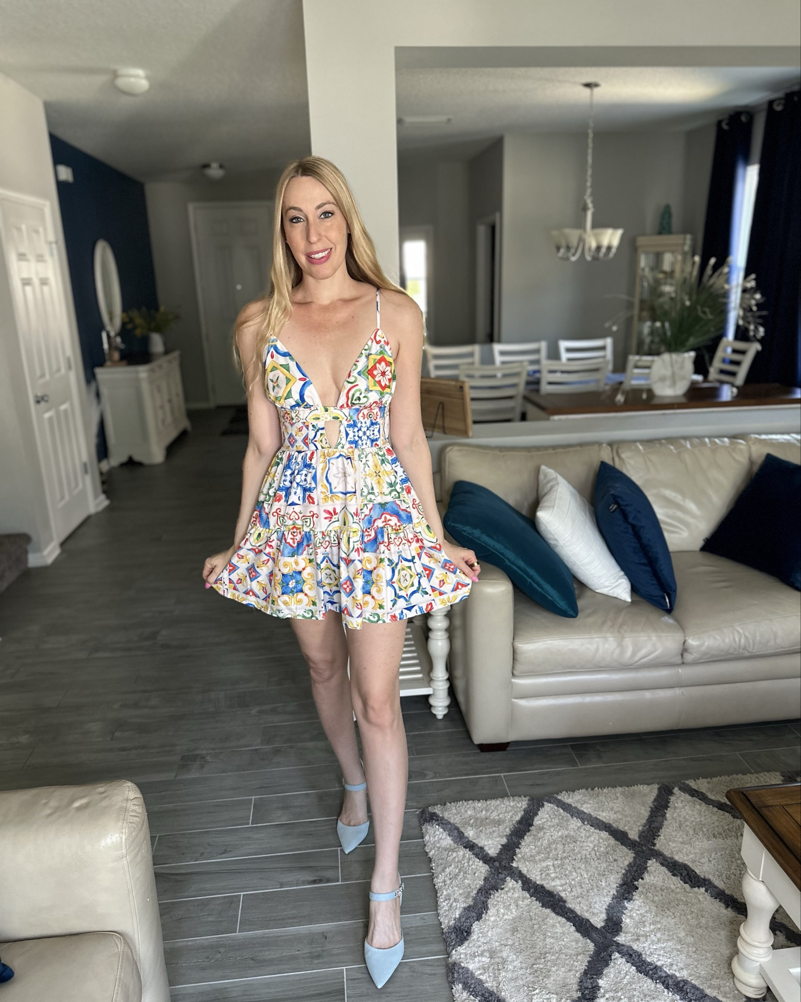 Colorful mini vacation dress
💙this dress is so cute and perfect for vacation 
🩵it has a lot of stretch and very short 
💙wearing small in it, fits true to size and I am 5’10”

#LTKStyleTip #LTKFindsUnder100 #LTKFindsUnder50