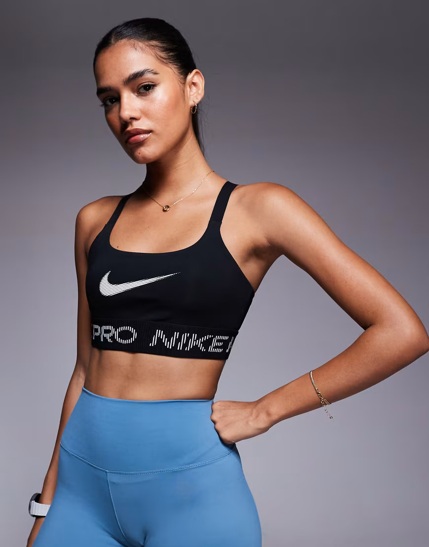 Nike Pro Training low support sports bra in black | ASOS (Global)