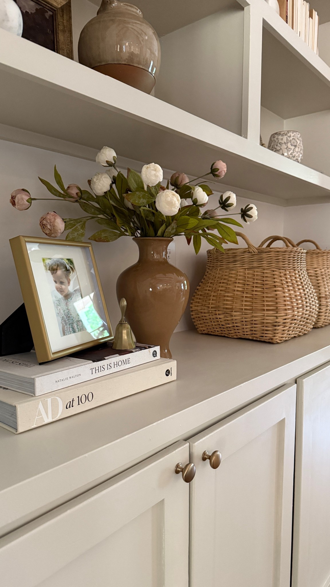 One of my favorite moments of our great room bookshelves! I have been enjoying updating our family photos around the house 🫶🏻

#LTKHome #LTKSeasonal #LTKStyleTip