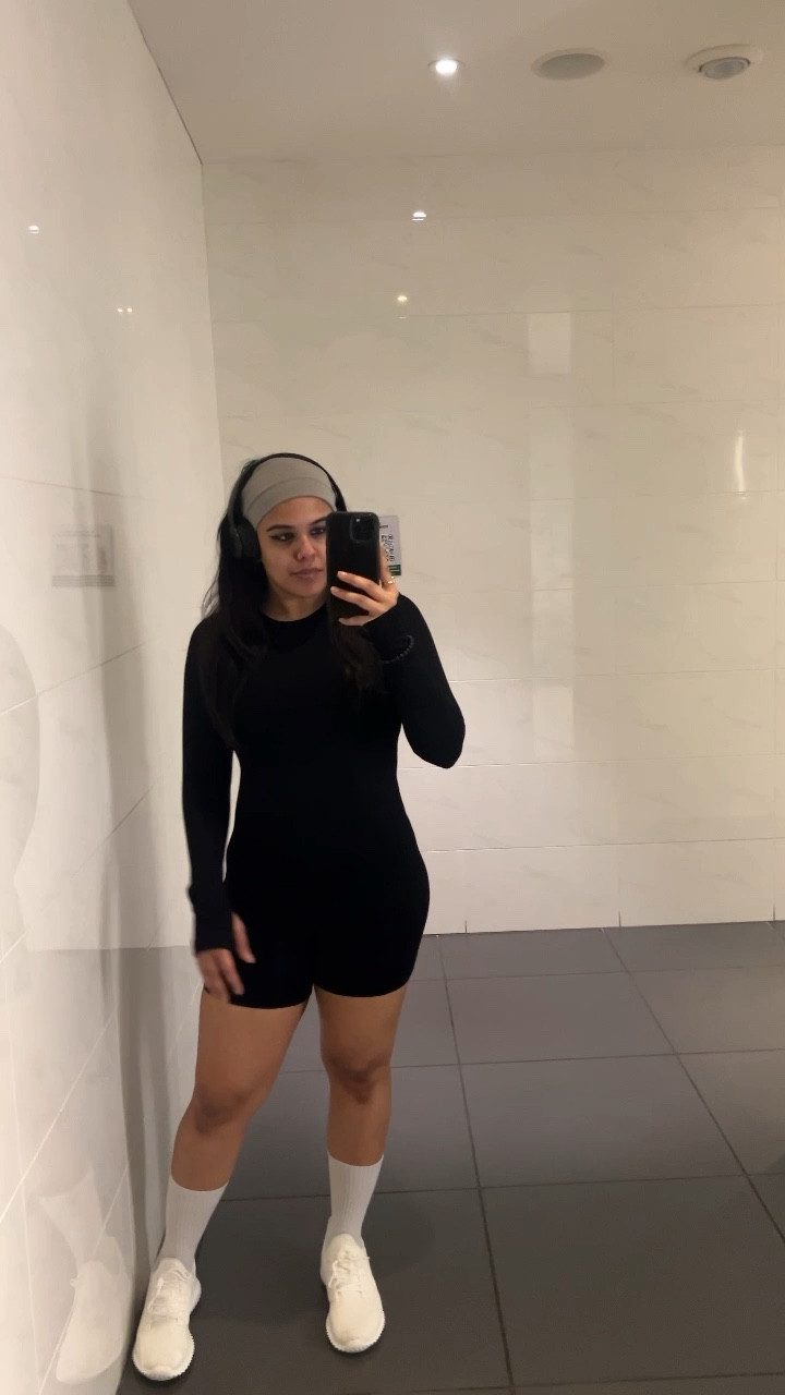Wore this black workout romper to the gym today. I wanted a black and white look so I paired this outfit with white sneakers and long socks. I added a grey headband as an accessory because I was having a bad hair day.

Most of this outfit was from Amazon, except the socks.

I’m so excited about wearing more fitness clothes that get me excited about the gym. Being midsize, finding leggings and sports bra that look flattering are hard. These different fits are great for midsize fitness days or casual errand days. Where do you get your workout clothes from?

#LTKmidsize #LTKfitness #LTKVideo